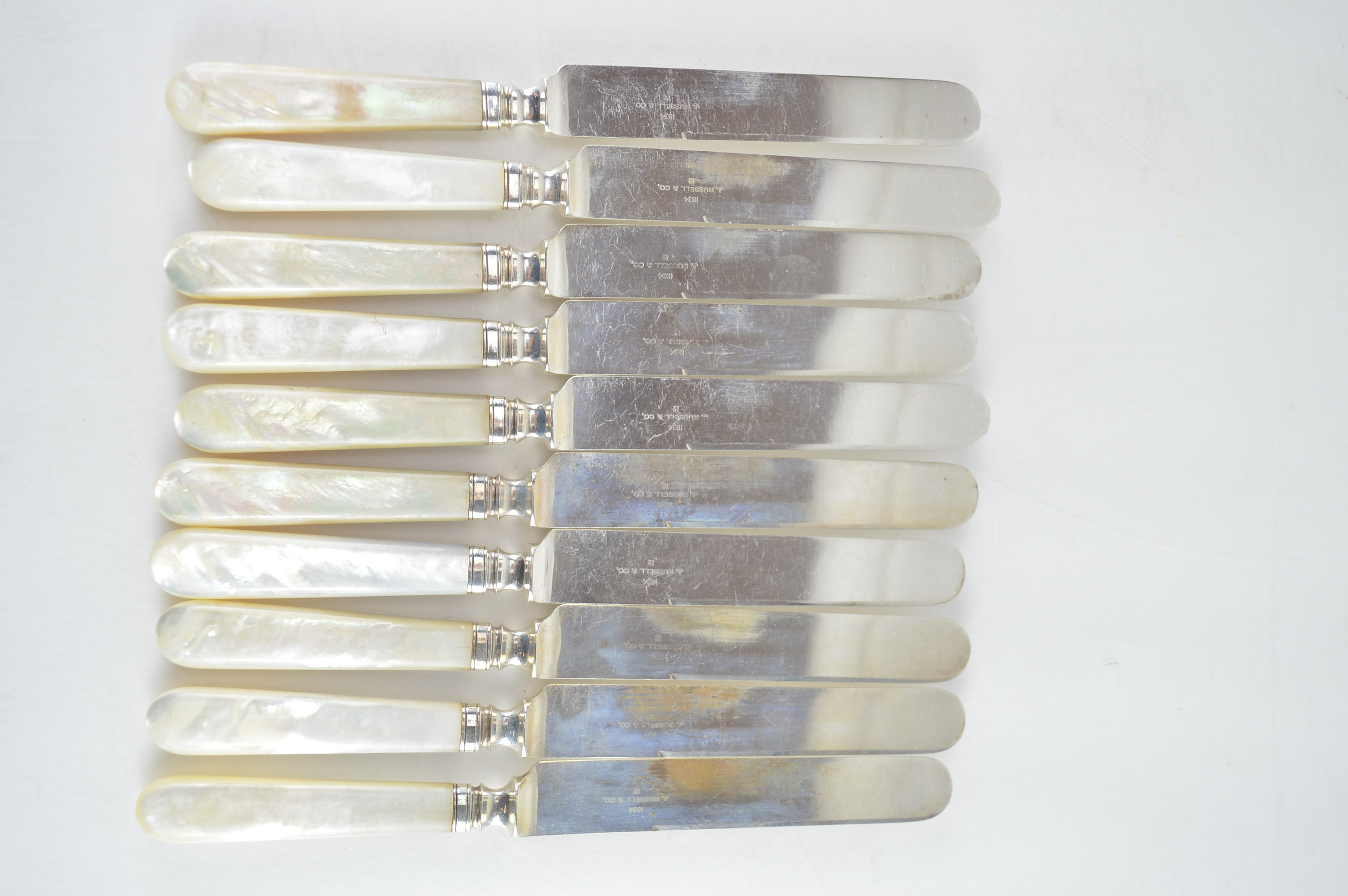 Mother of Pearl Handled Flatware and a Silver Plate Spoon