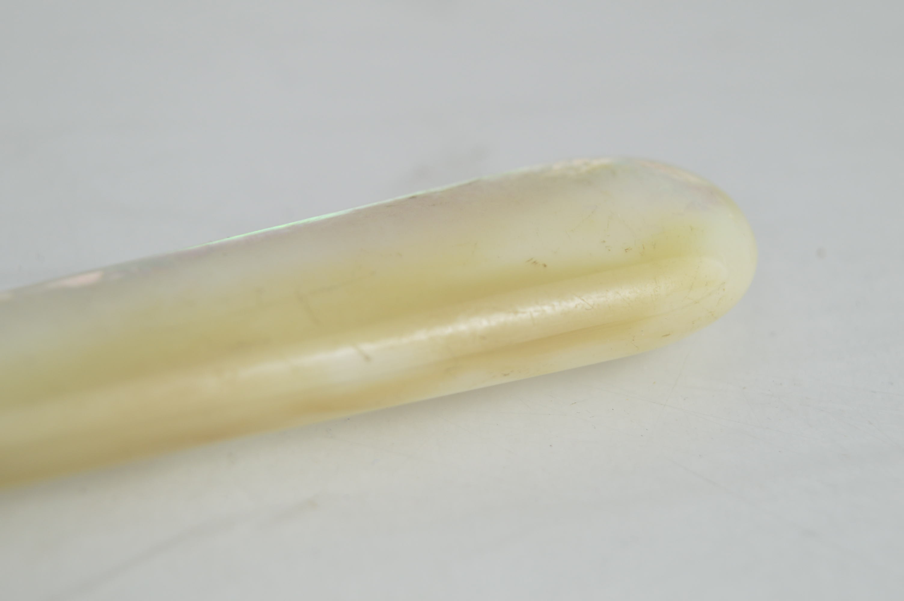 Mother of Pearl Handled Flatware and a Silver Plate Spoon