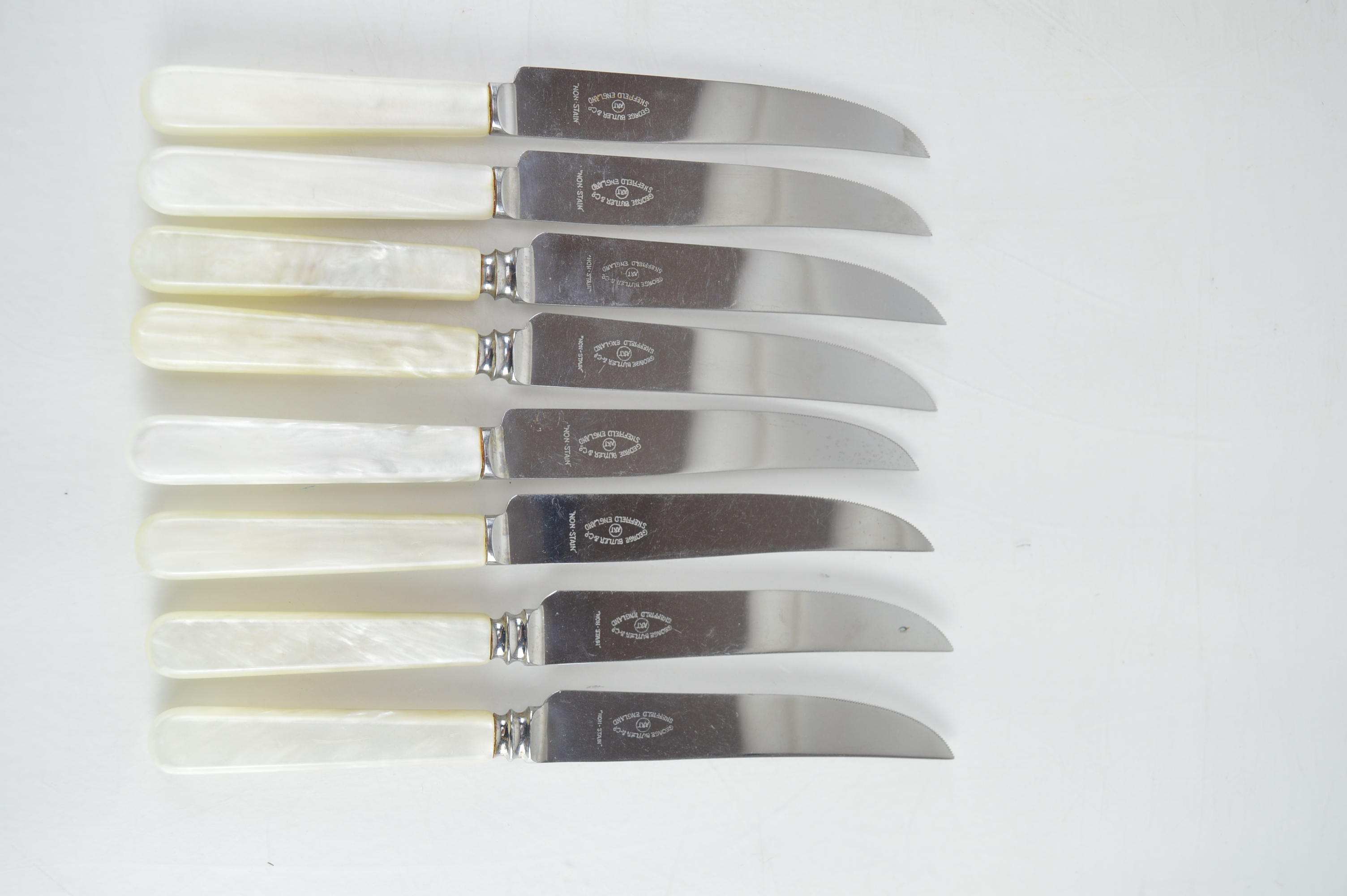 Mother of Pearl Handled Flatware and a Silver Plate Spoon