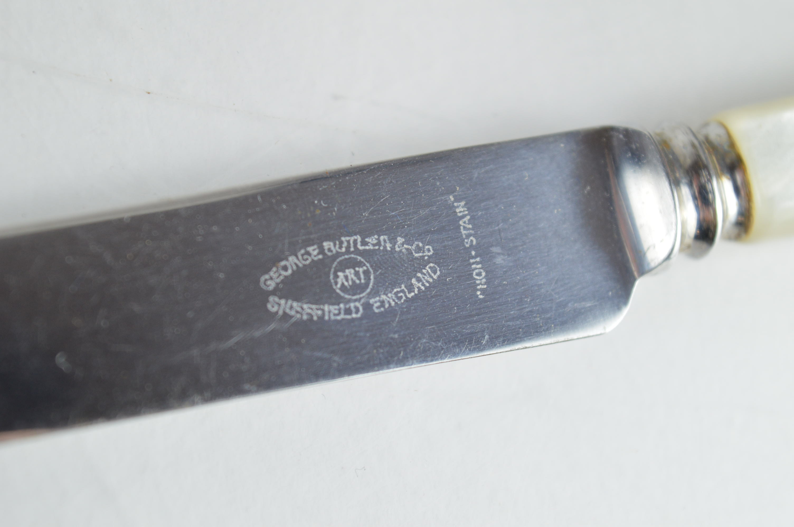 Mother of Pearl Handled Flatware and a Silver Plate Spoon