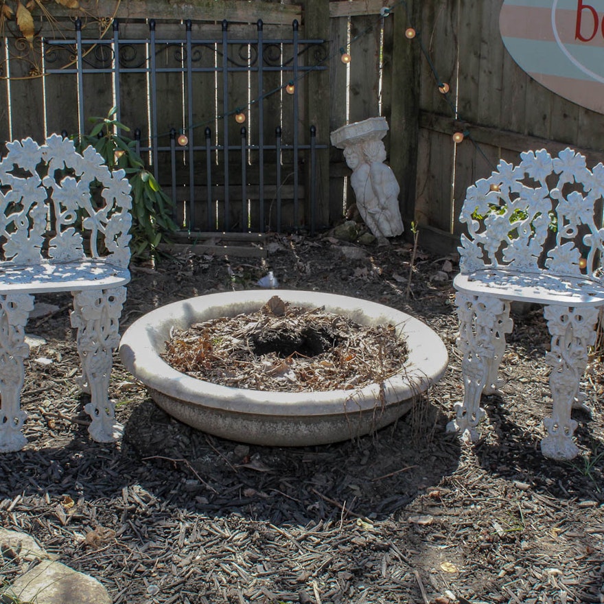 Marble Fountain and White Iron Chairs