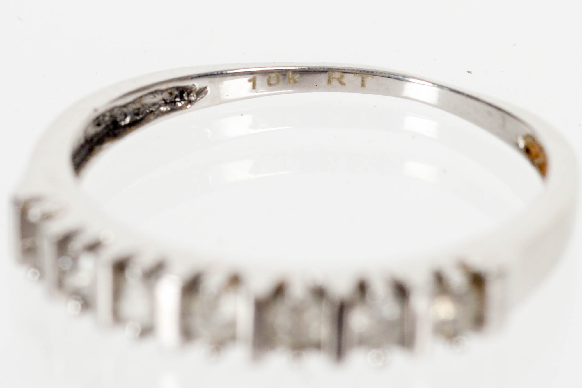 10K White Gold Ring with Diamonds