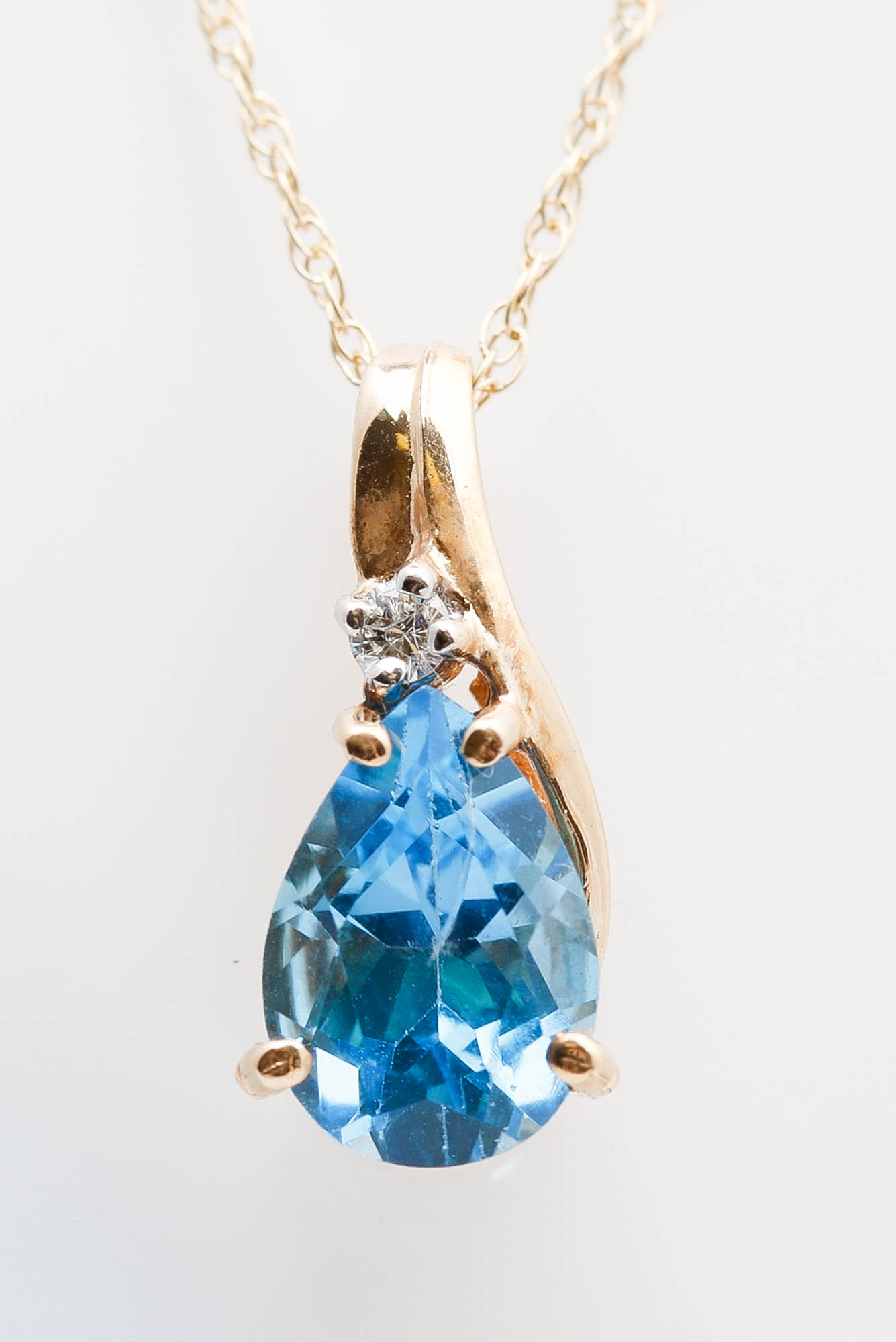 14K Yellow Gold Blue Topaz and Diamond Pendant Necklace