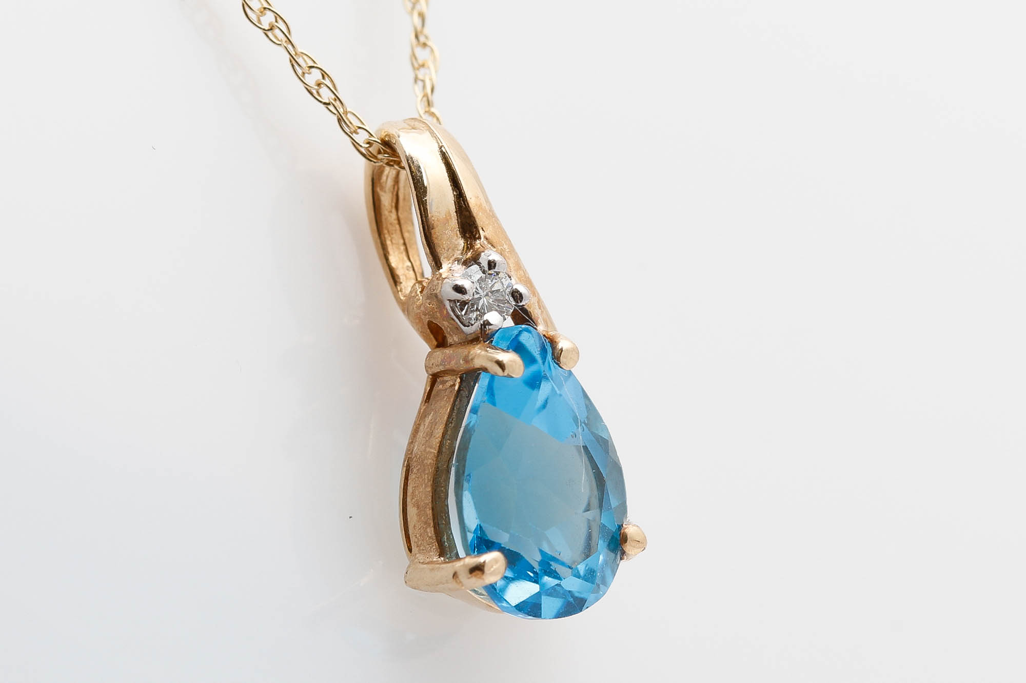 14K Yellow Gold Blue Topaz and Diamond Pendant Necklace