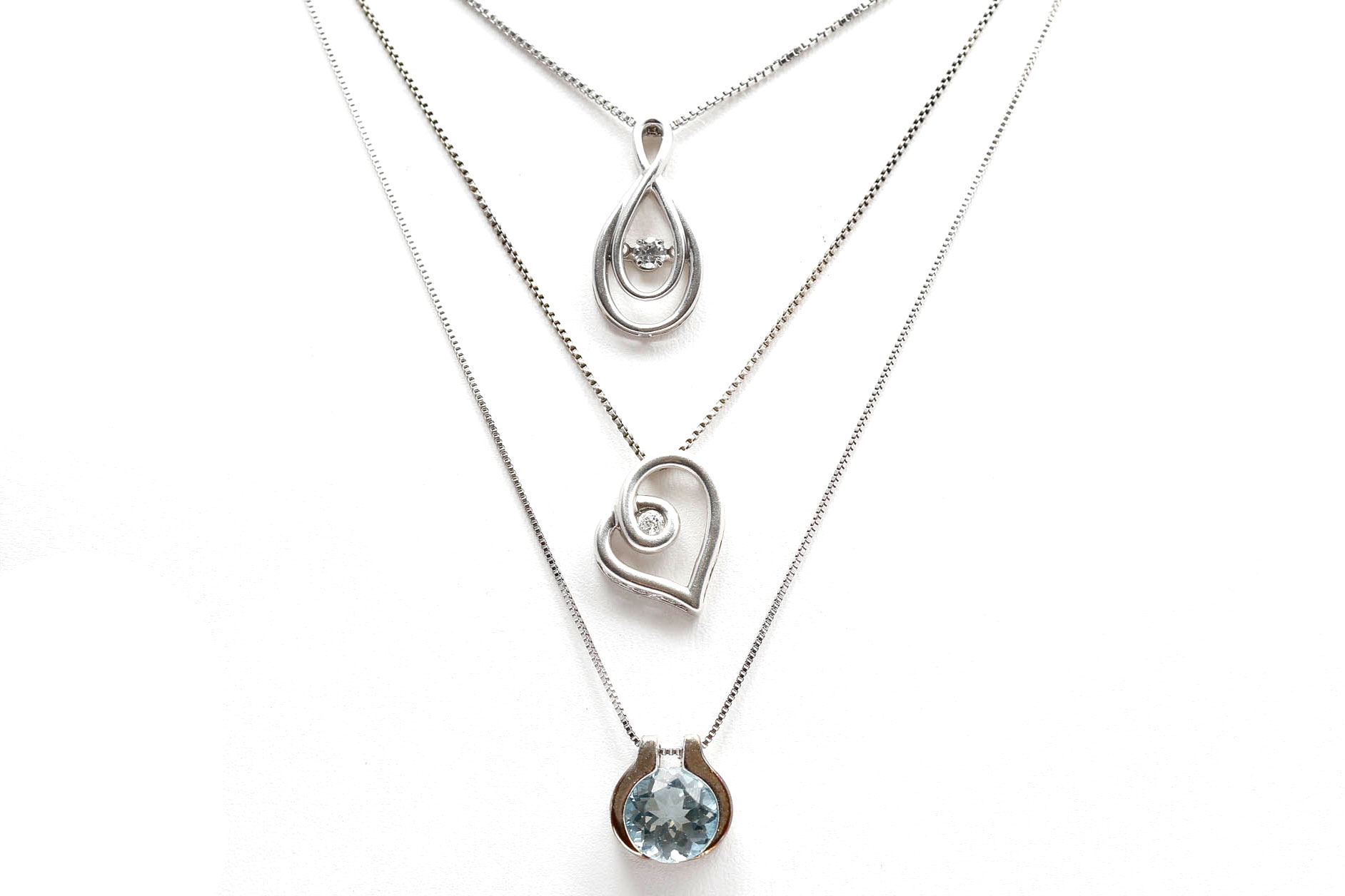 Sterling Silver Diamond and Blue Topaz Pendant Necklaces