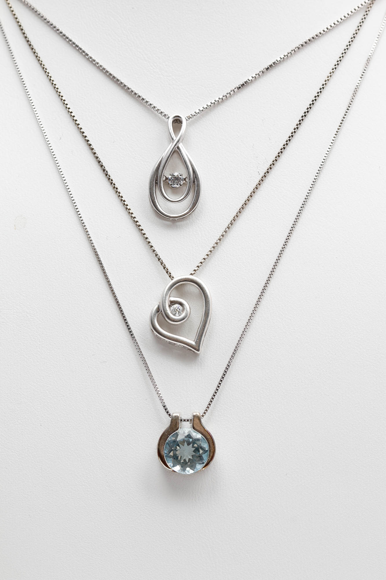 Sterling Silver Diamond and Blue Topaz Pendant Necklaces