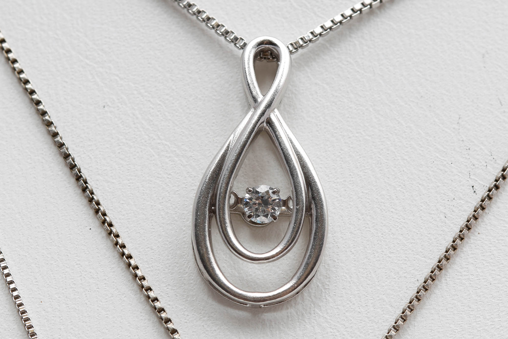 Sterling Silver Diamond and Blue Topaz Pendant Necklaces