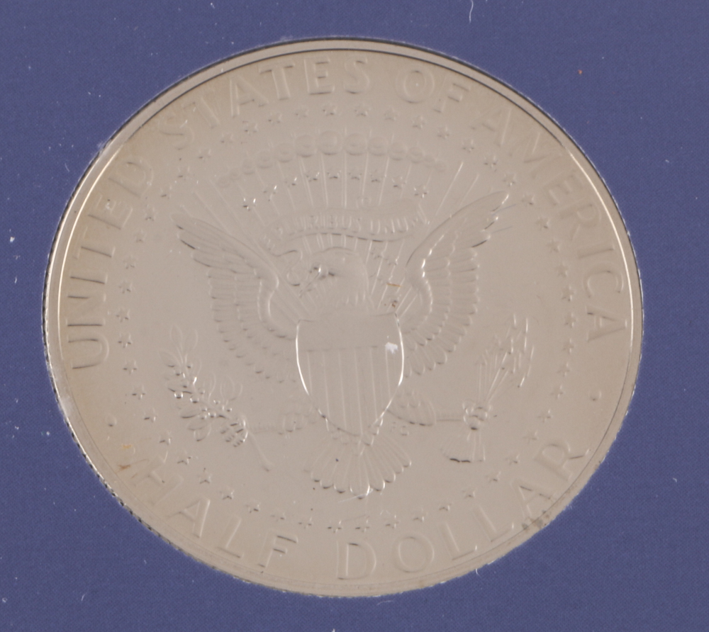 2000 U.S. Mint Proof Set and Three 2002 Statehood Quarters Proof Sets