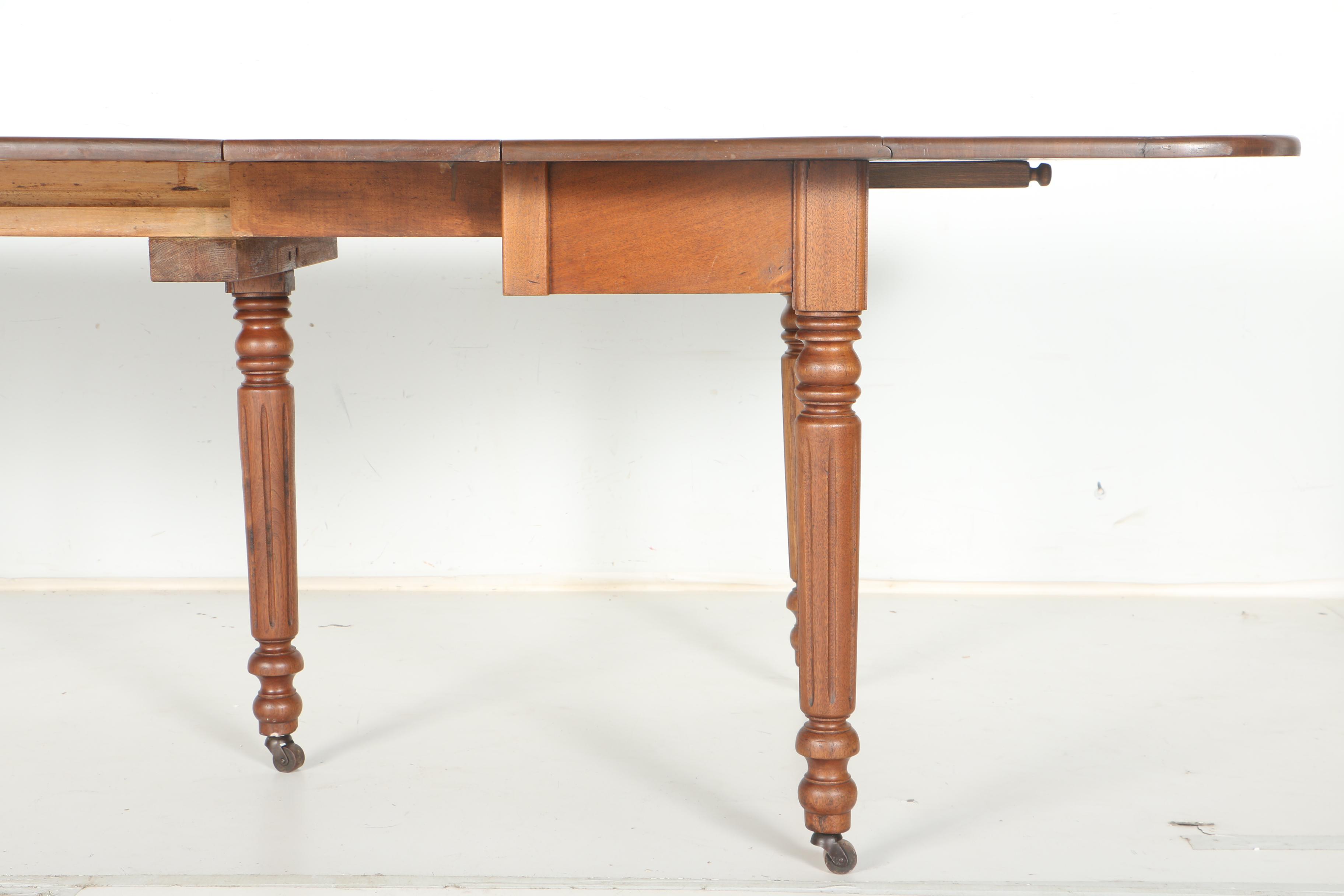 Drop Leaf Walnut Dining Table
