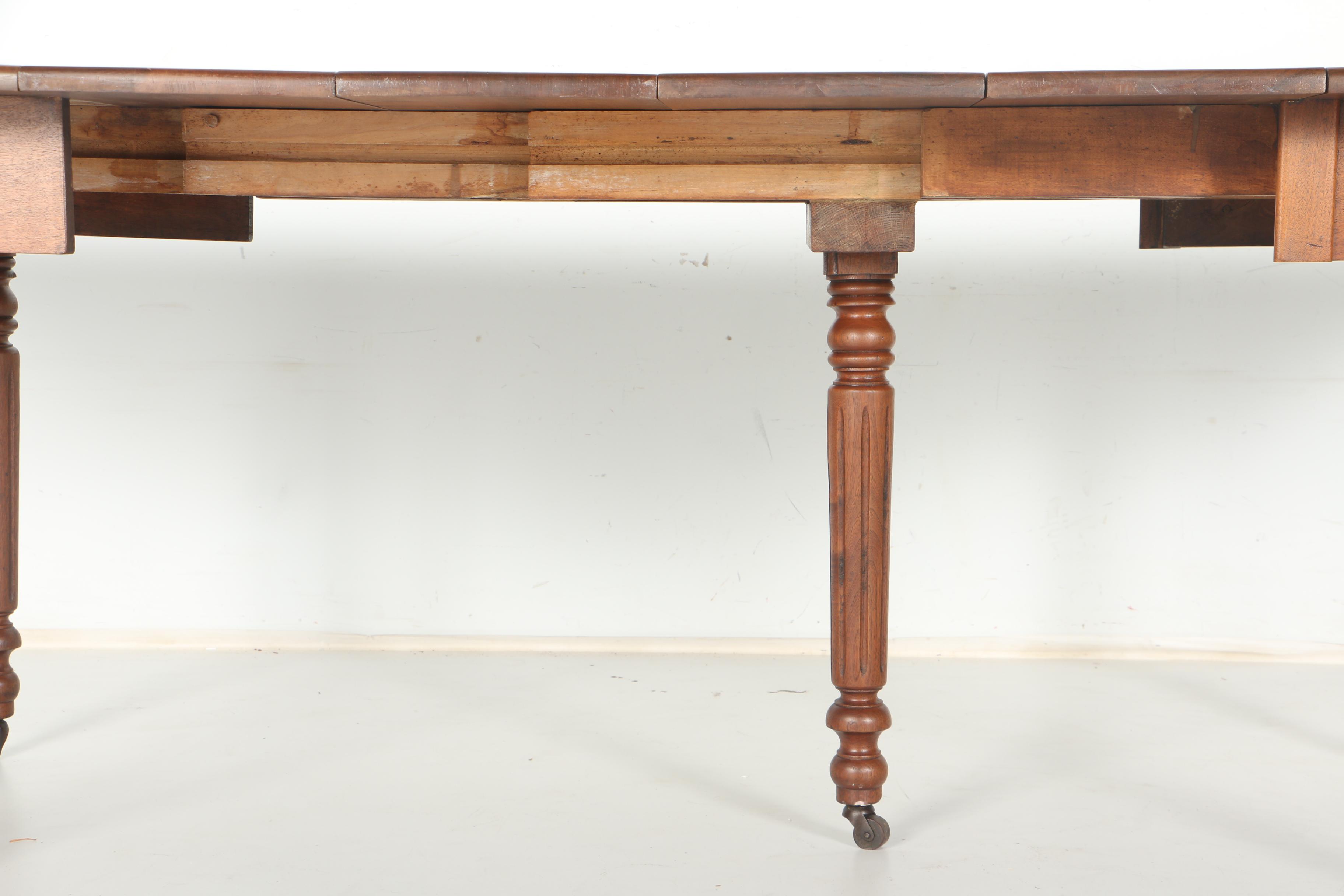 Drop Leaf Walnut Dining Table