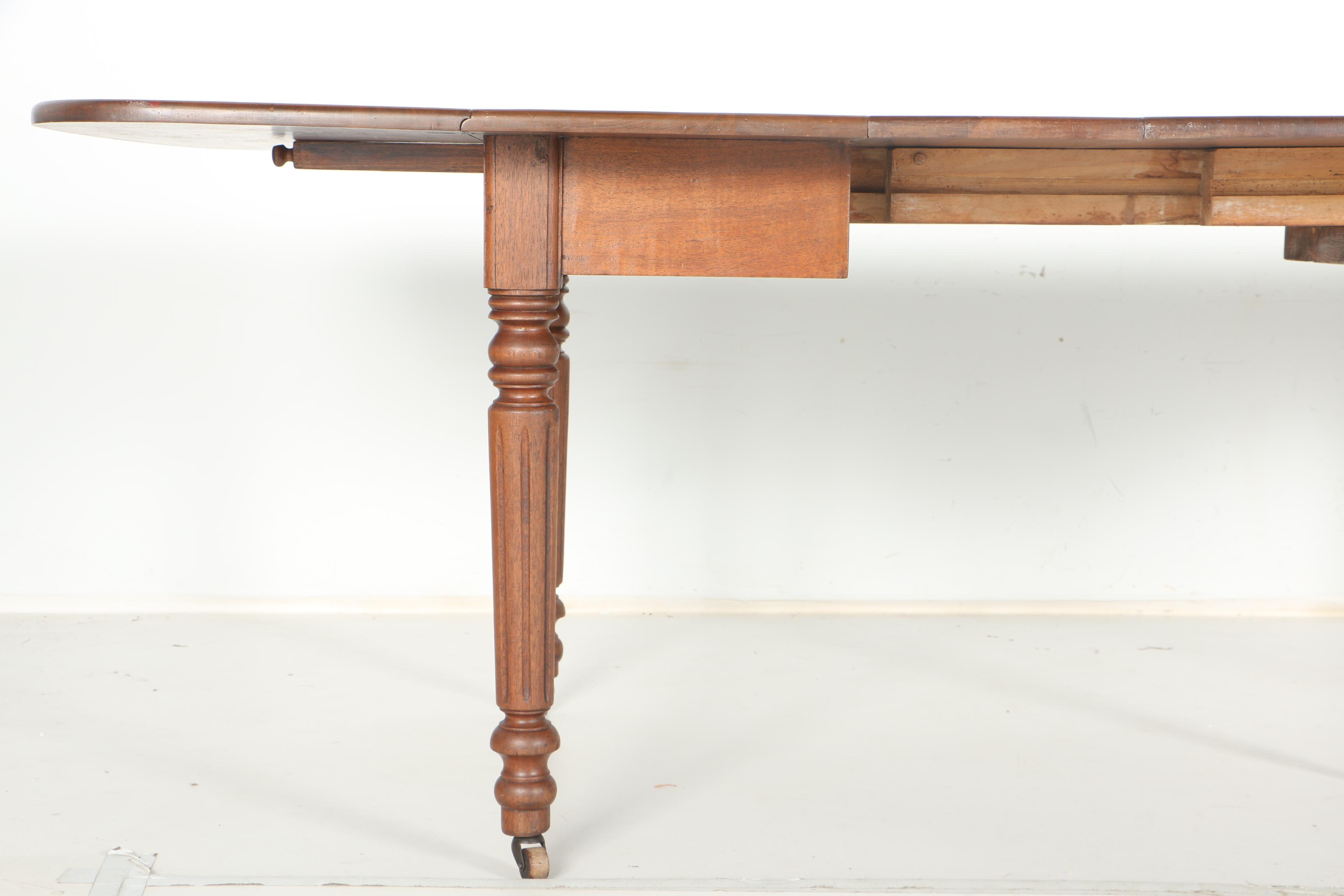 Drop Leaf Walnut Dining Table