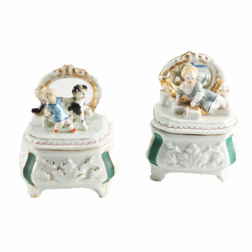 Two Staffordshire Figural Trinket Boxes