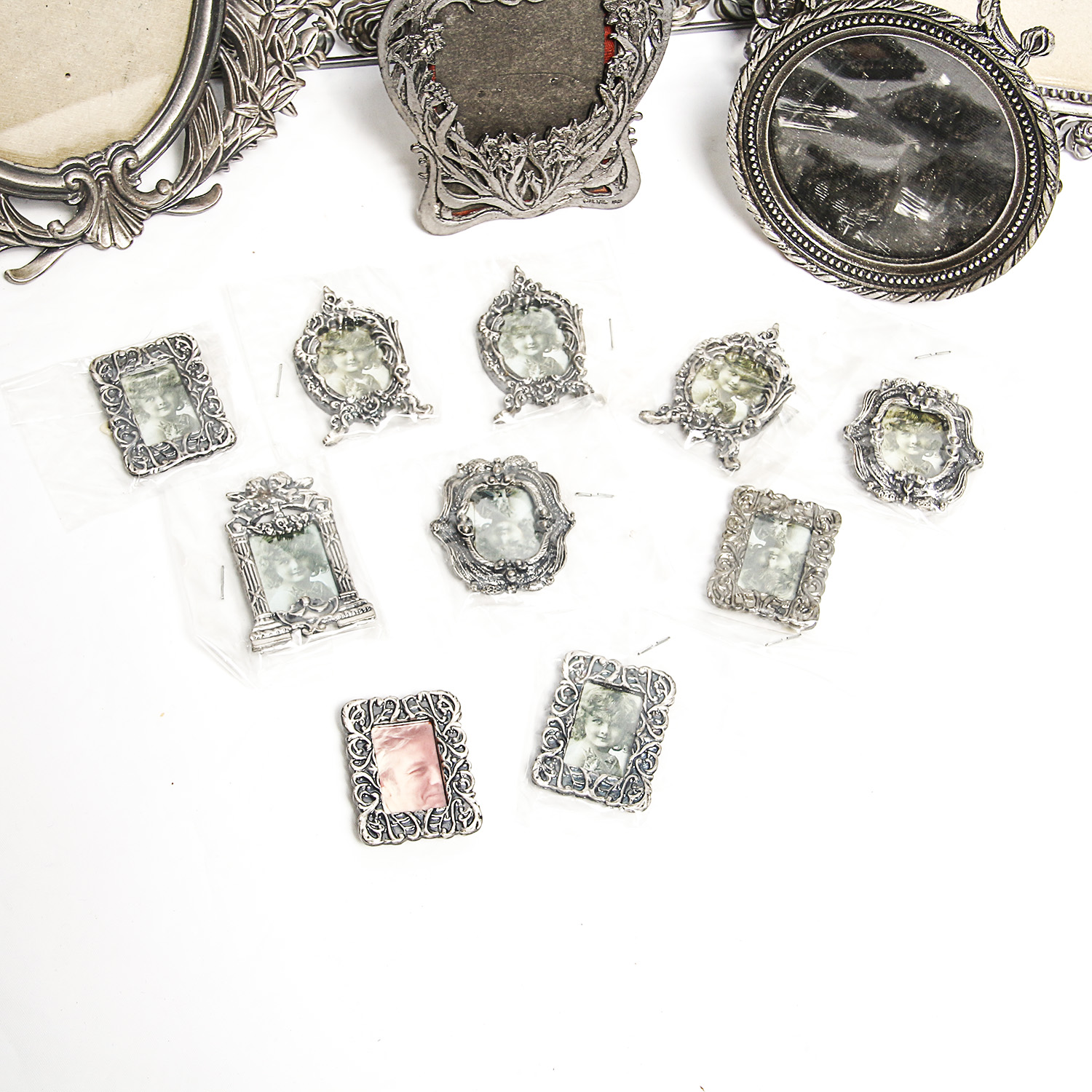 Pewter Frames Including Metzke