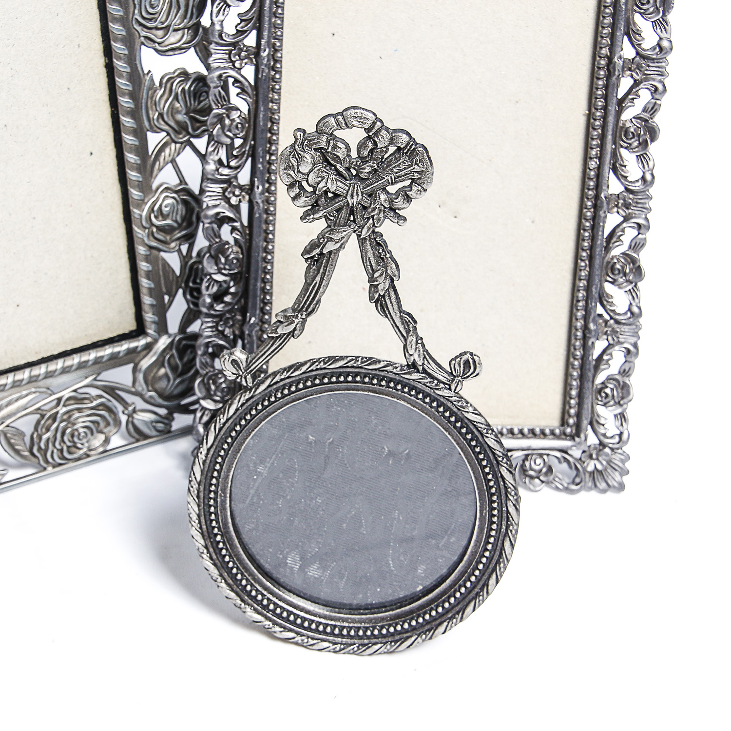 Pewter Frames Including Metzke