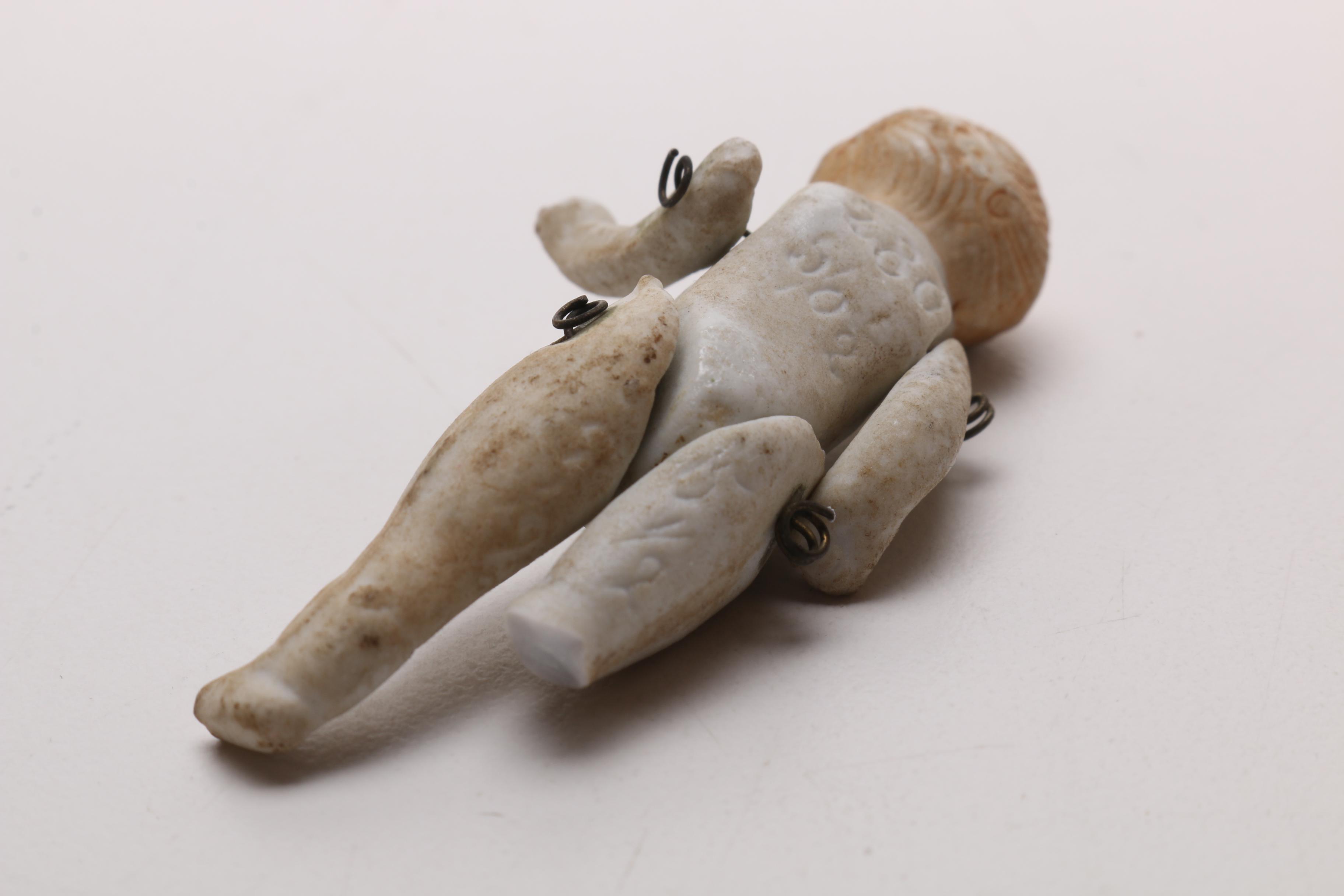 1930s Porcelain Figure and Miniature Jointed Doll