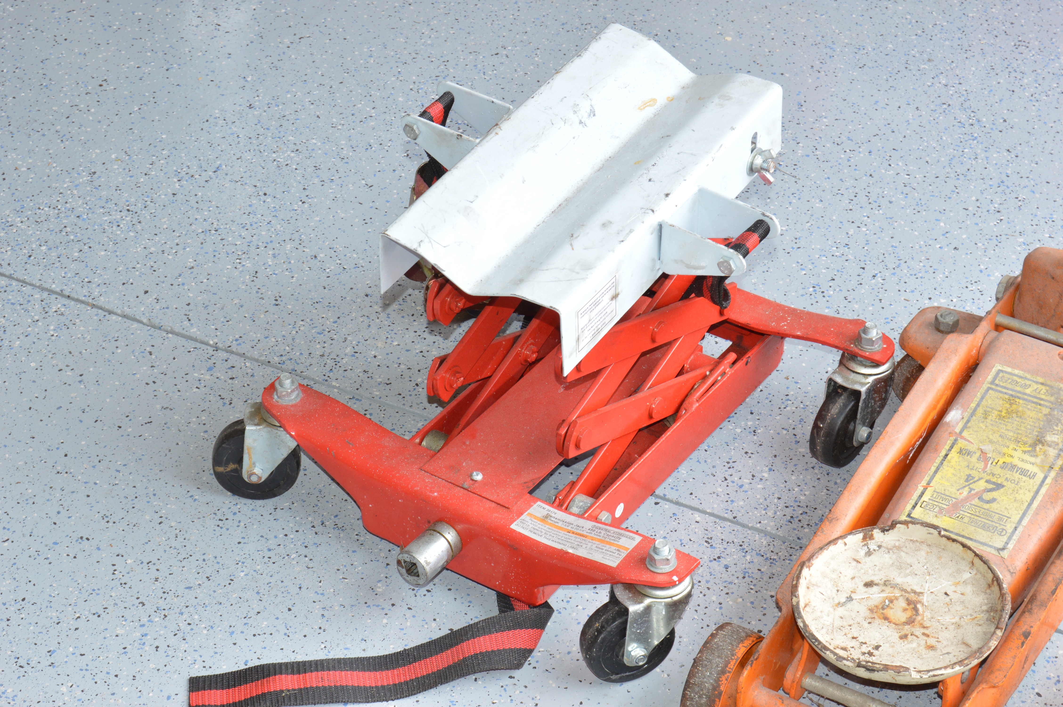 Pair of Floor Jacks and Portable Halogen Light