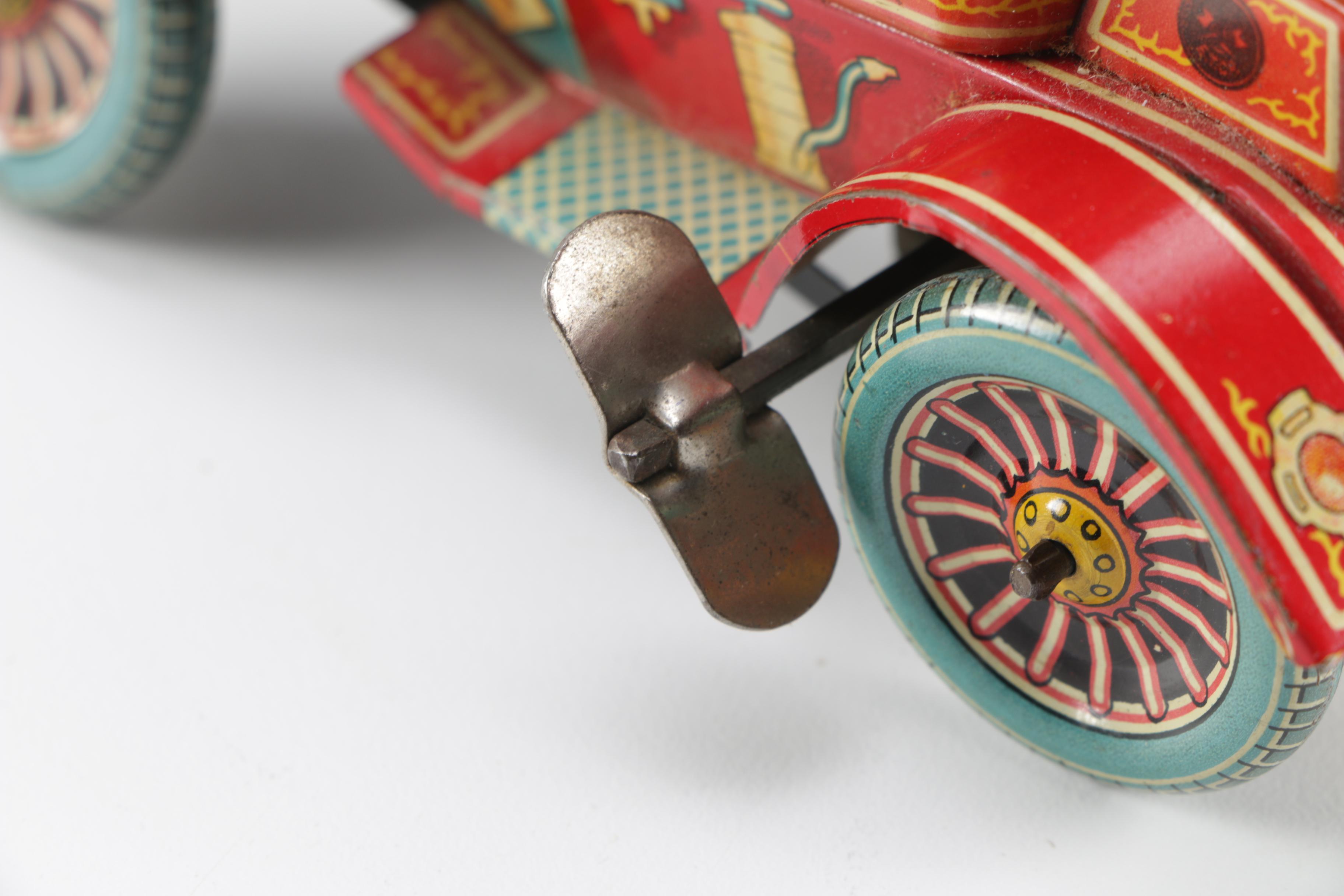 Vintage "Grandpa's New Car" Tin Wind-Up Toy