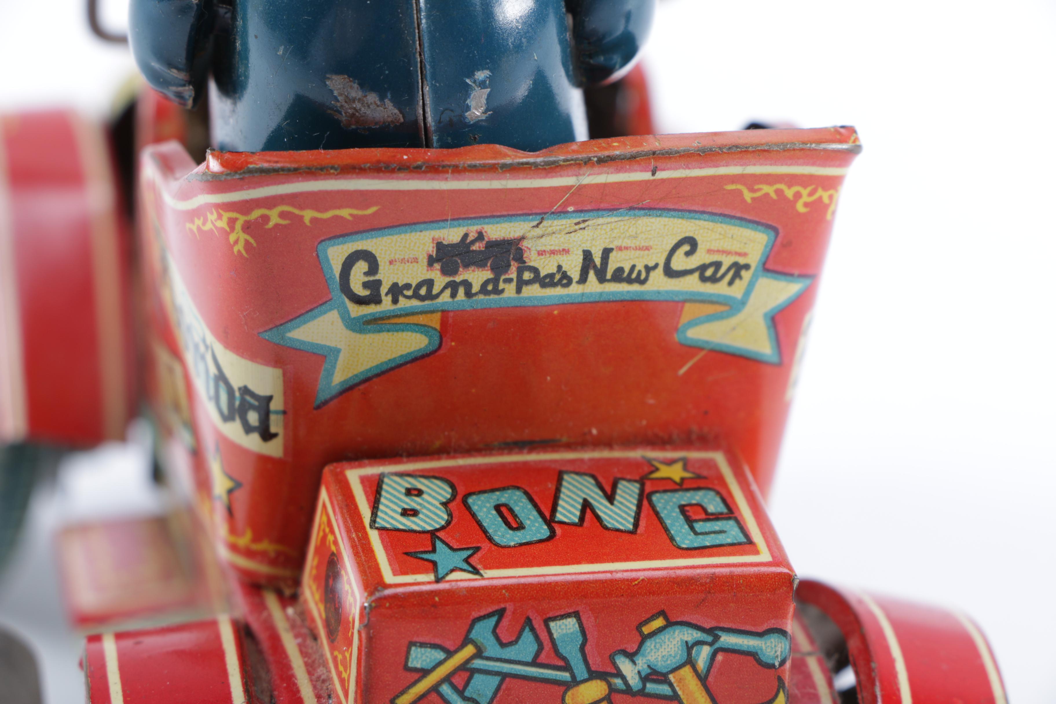 Vintage "Grandpa's New Car" Tin Wind-Up Toy