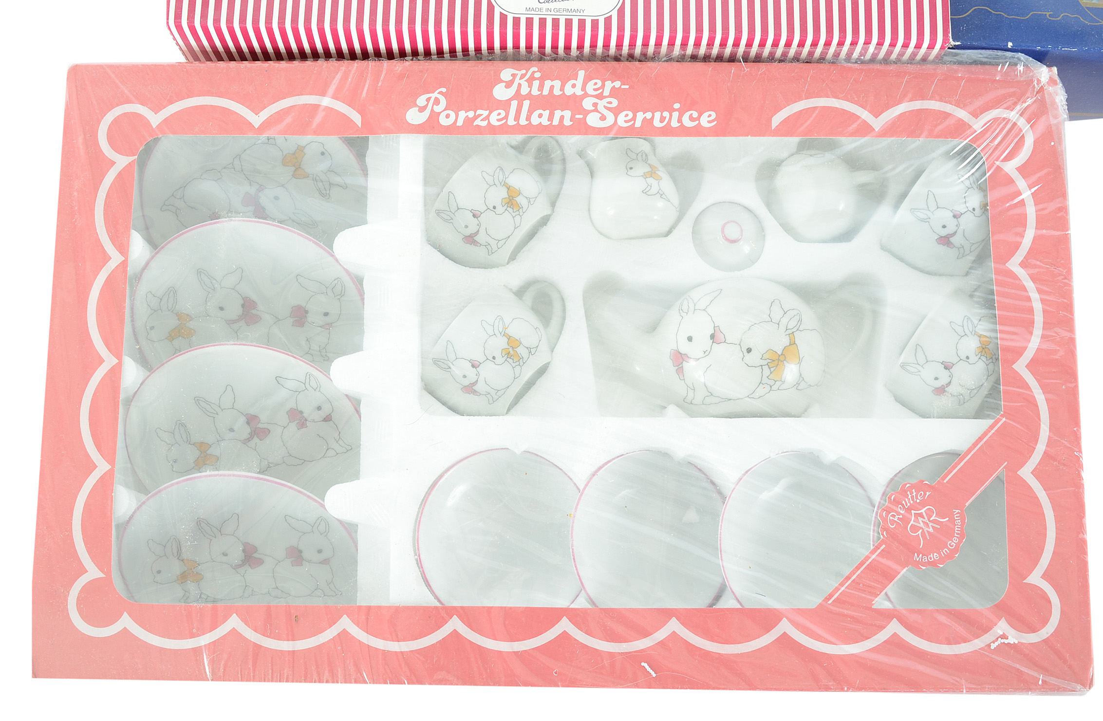 Three Children's Kinder-Porzellan Tea Sets with Cookie Cutters