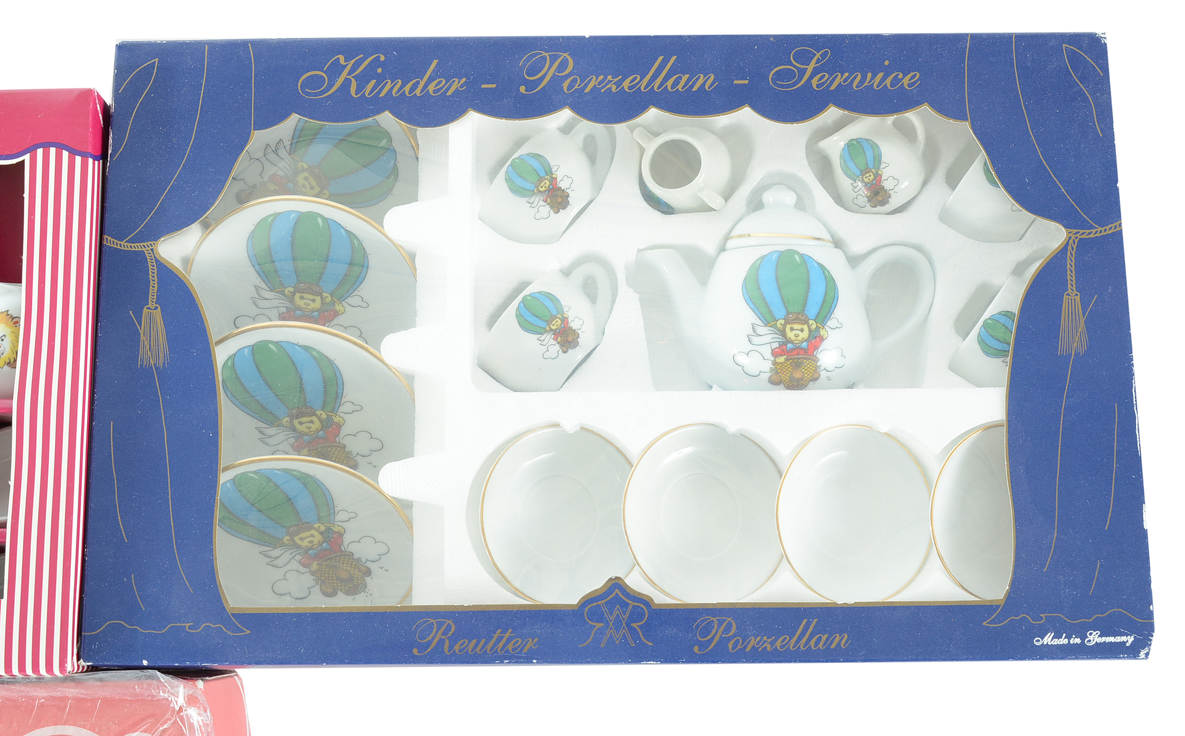 Three Children's Kinder-Porzellan Tea Sets with Cookie Cutters