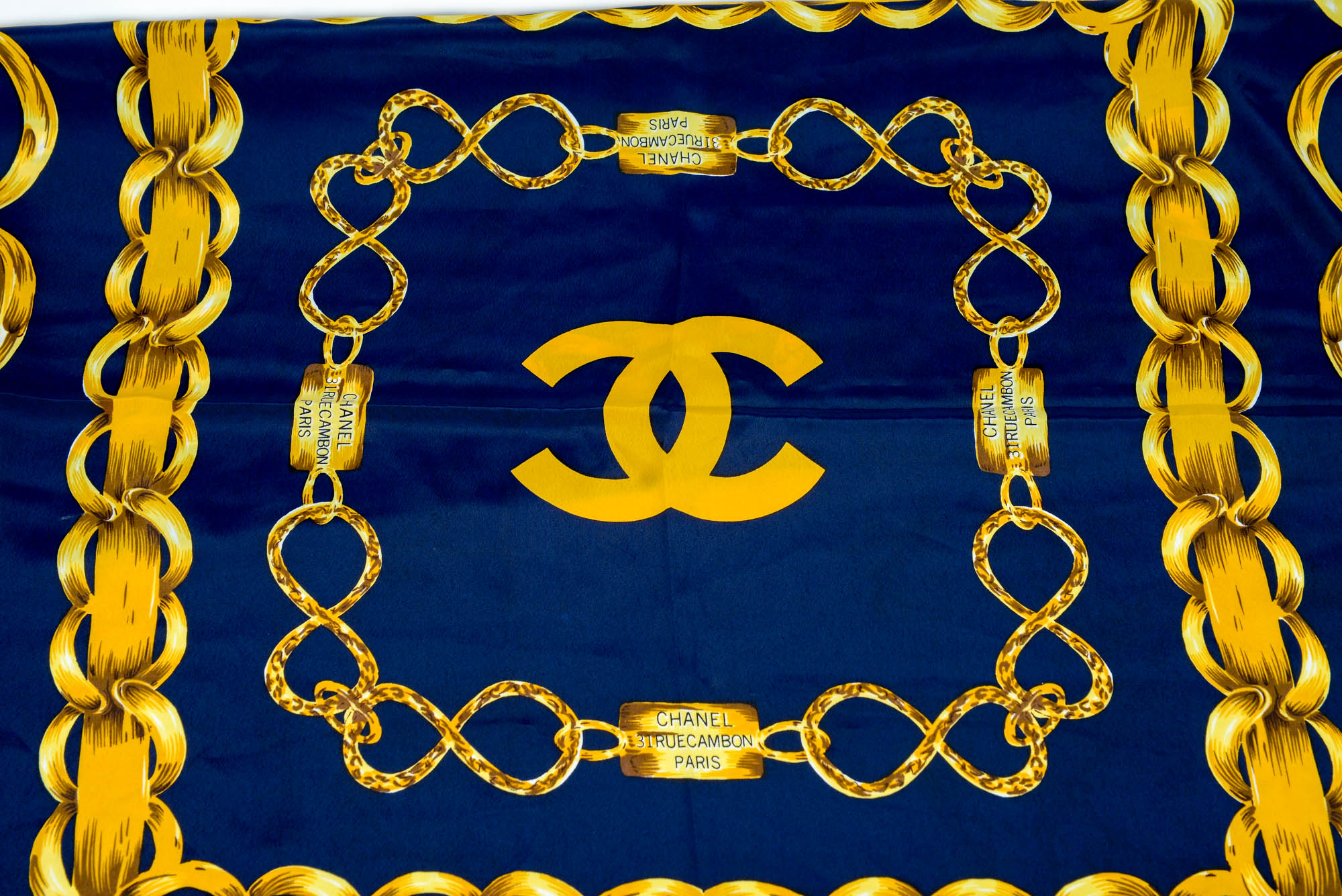 Chanel Silk Scarf with Chain Logo Design