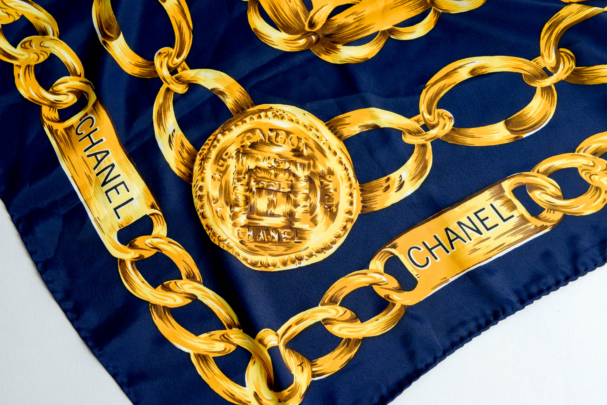 Chanel Silk Scarf with Chain Logo Design