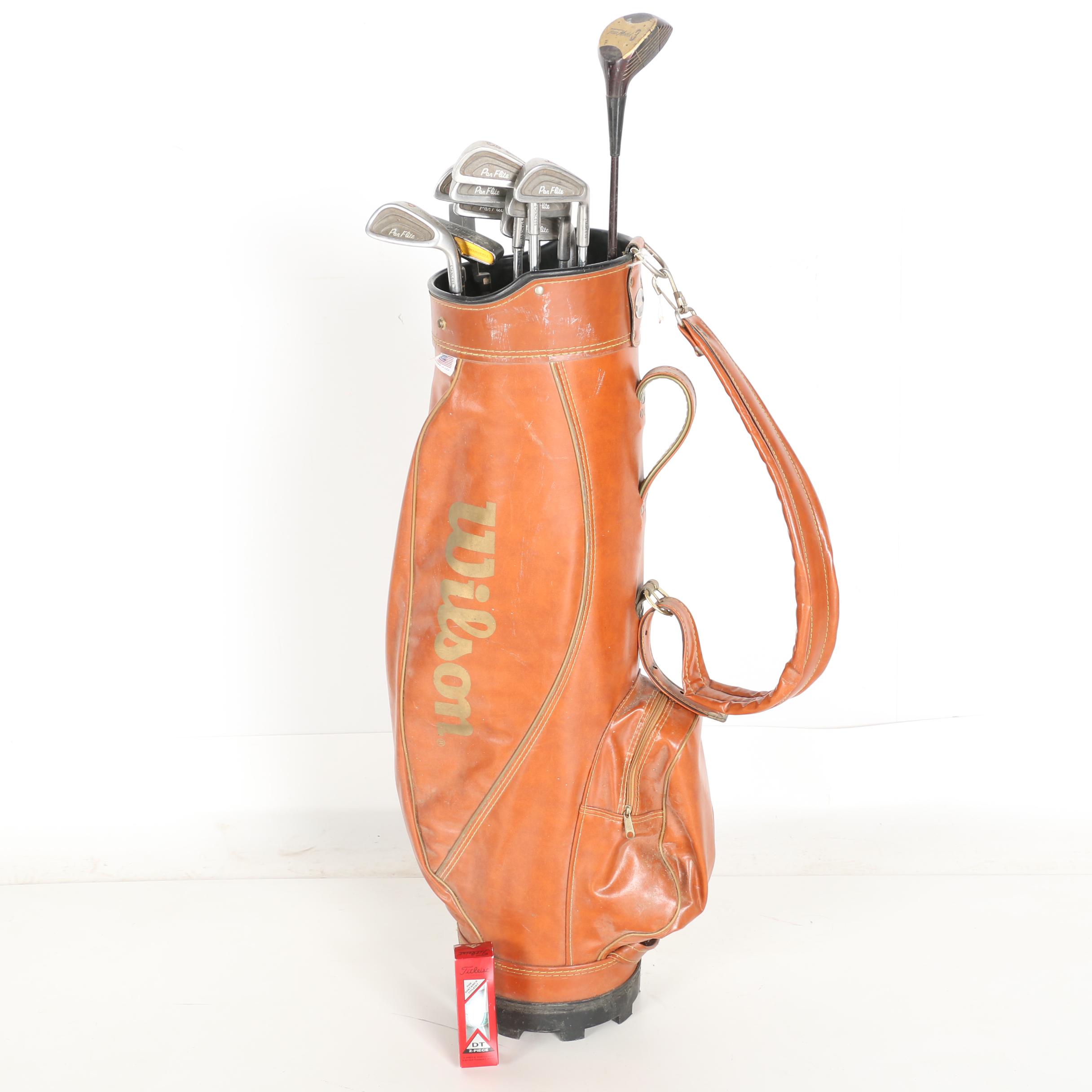 Wilson Golf Bag and Various Clubs Featuring Spalding and Spotline