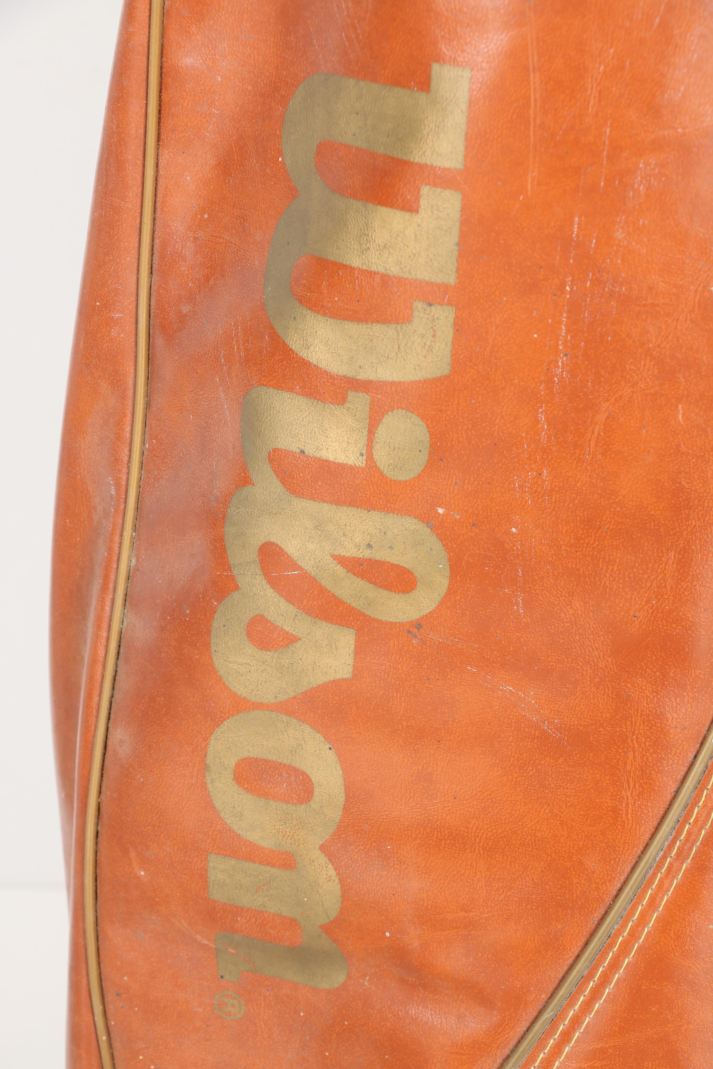 Wilson Golf Bag and Various Clubs Featuring Spalding and Spotline