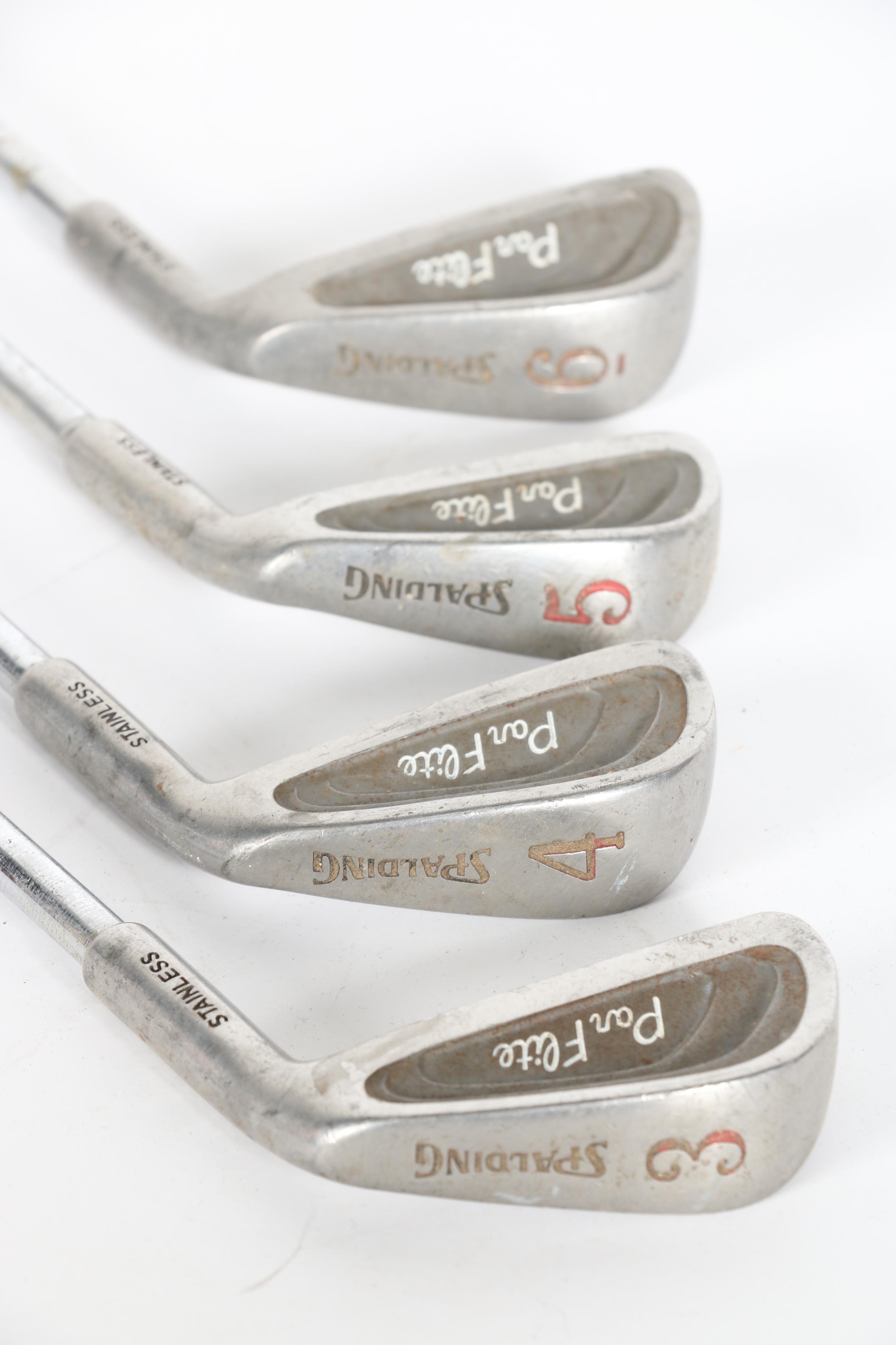 Wilson Golf Bag and Various Clubs Featuring Spalding and Spotline