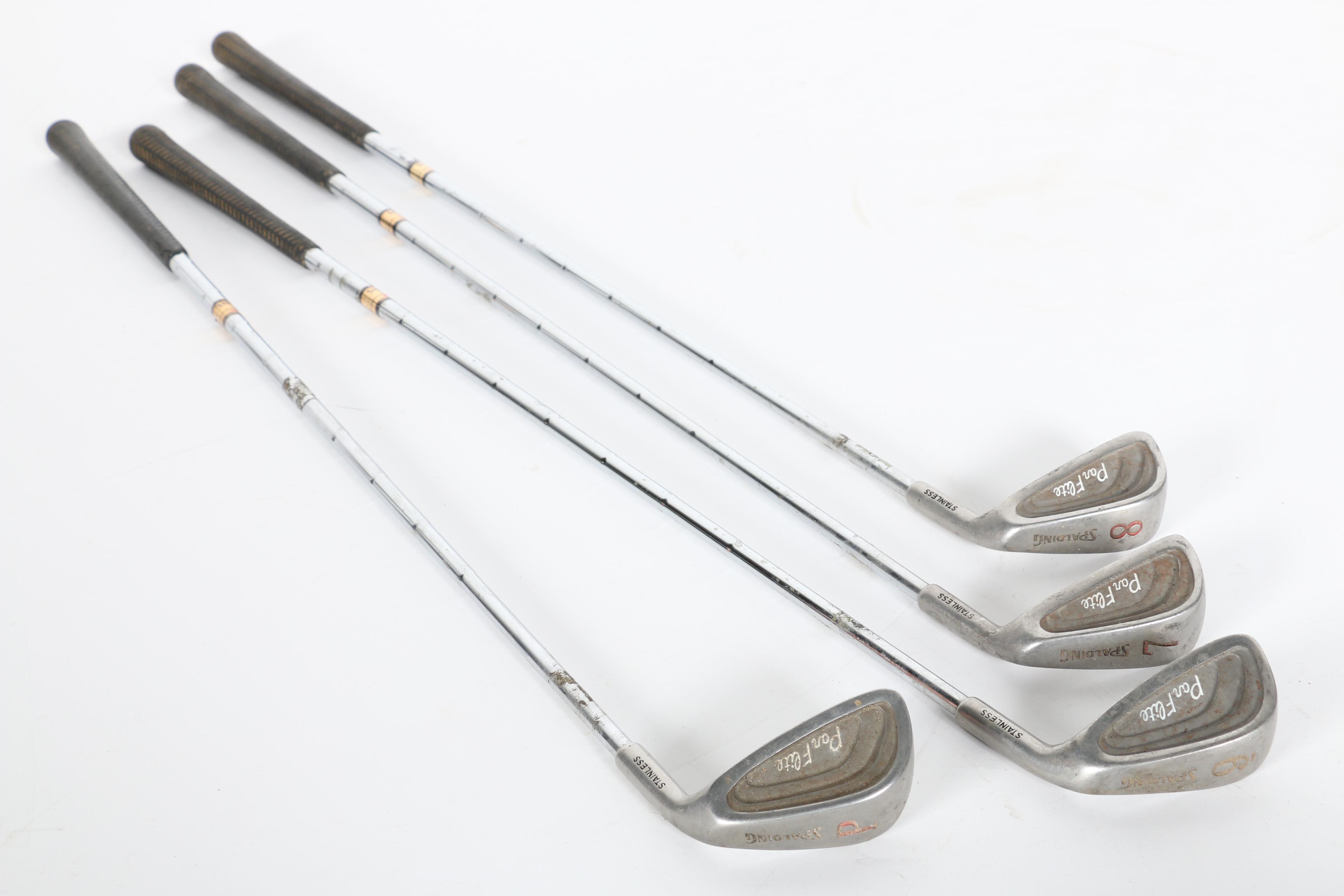 Wilson Golf Bag and Various Clubs Featuring Spalding and Spotline