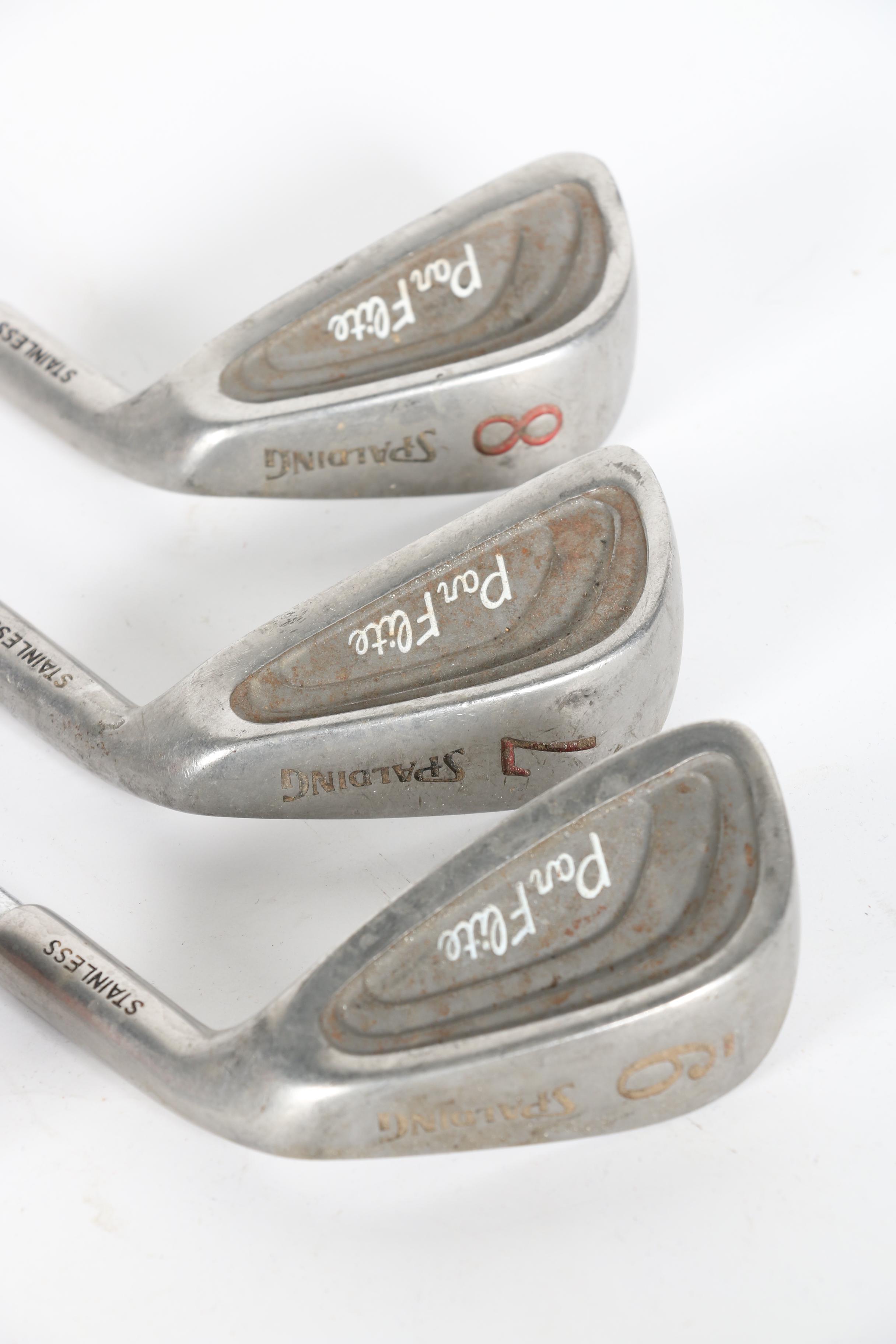 Wilson Golf Bag and Various Clubs Featuring Spalding and Spotline