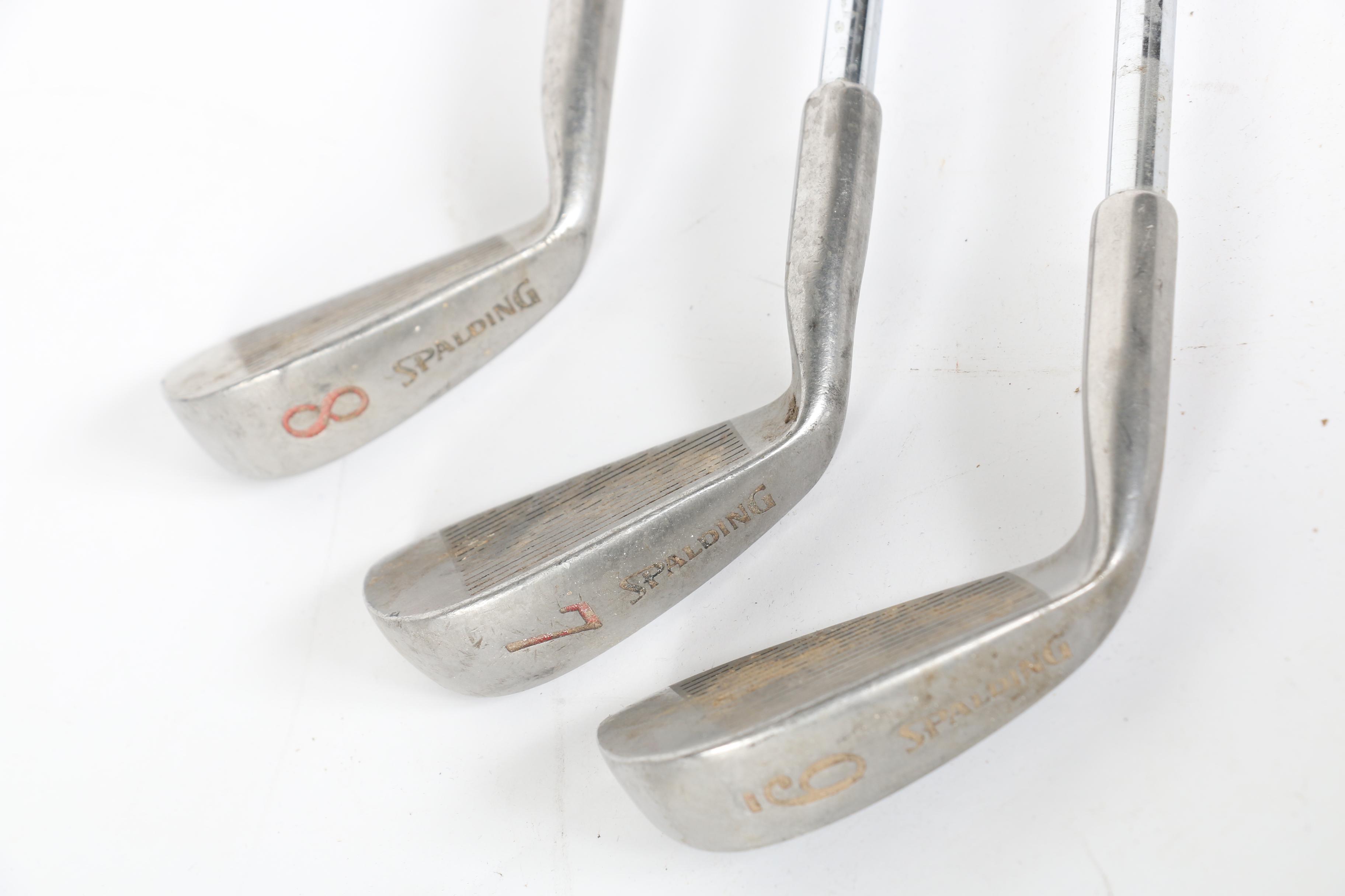 Wilson Golf Bag and Various Clubs Featuring Spalding and Spotline