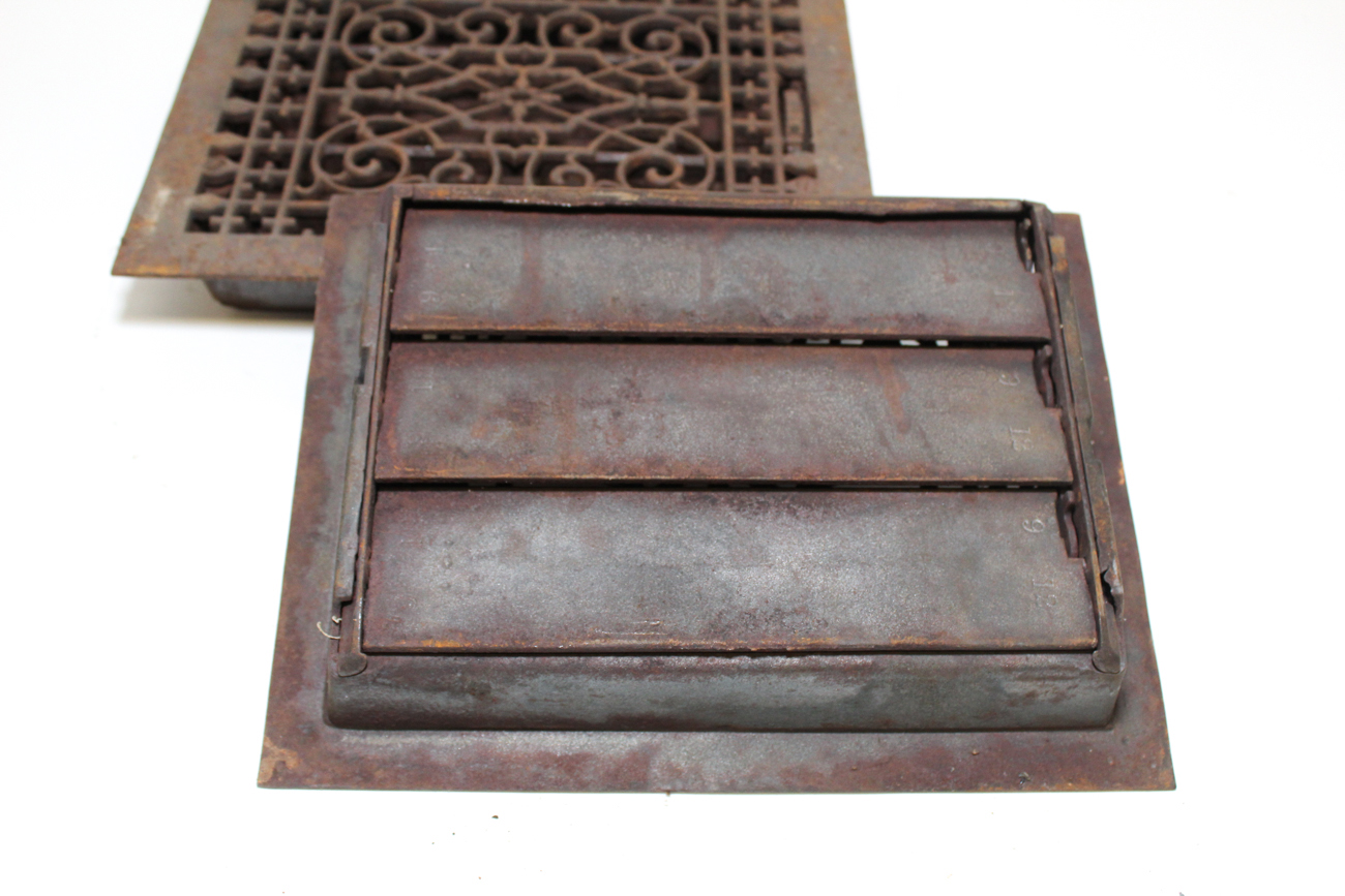Pair of Antique Cast Iron Floor Grates