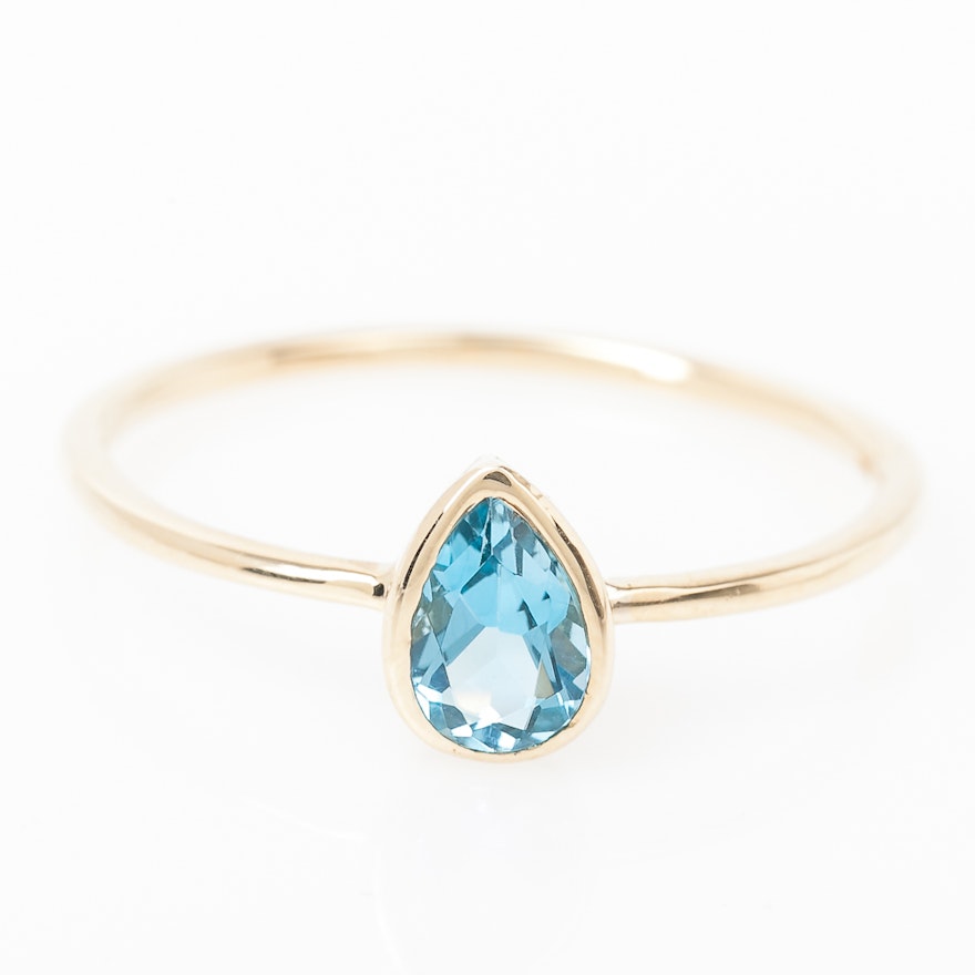 14K Yellow Gold and Bezel Set Blue Topaz Solitaire Ring