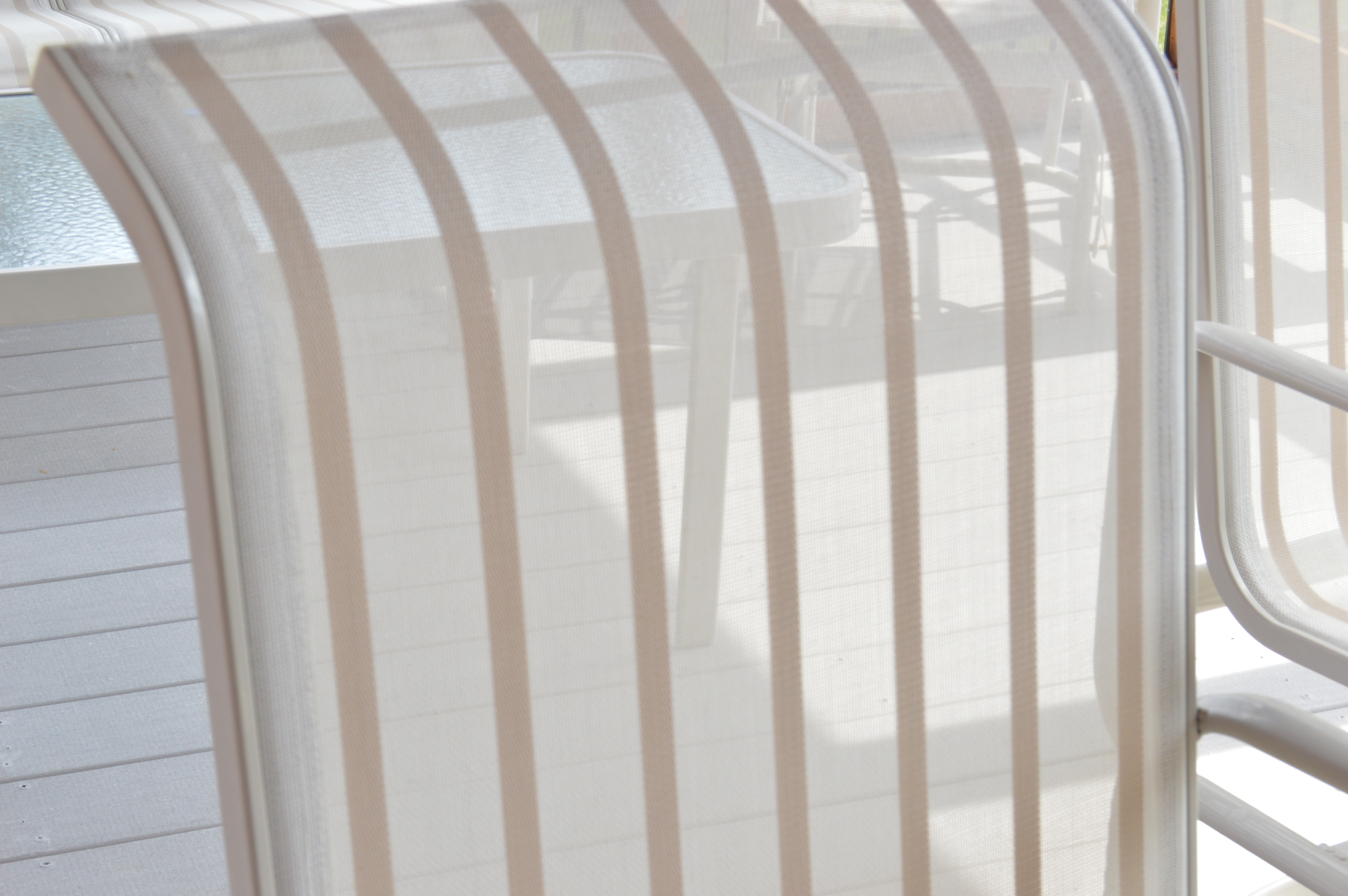 Outdoor Dining Table and Chair Set by Suncoast