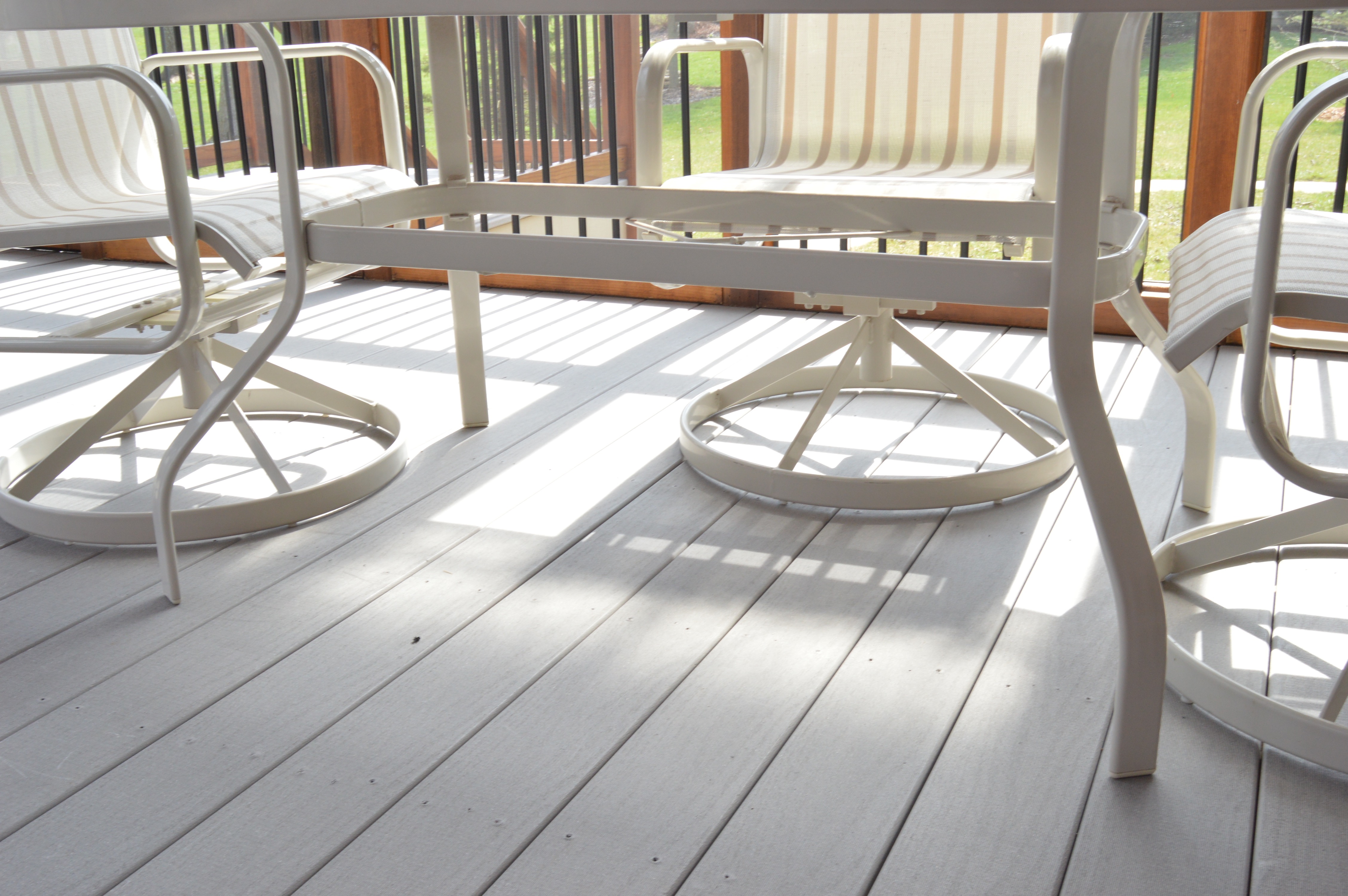 Outdoor Dining Table and Chair Set by Suncoast