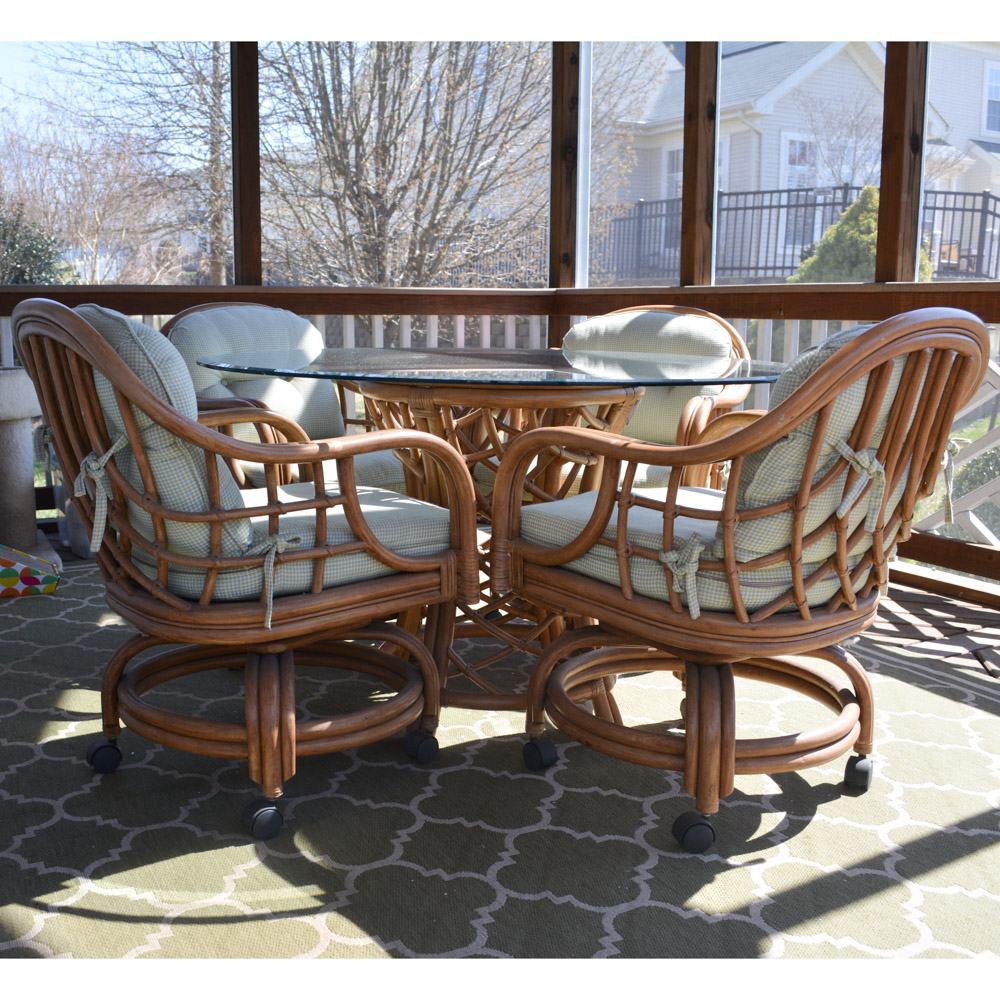 Glass-Top Pedestal Table with Rattan Chairs