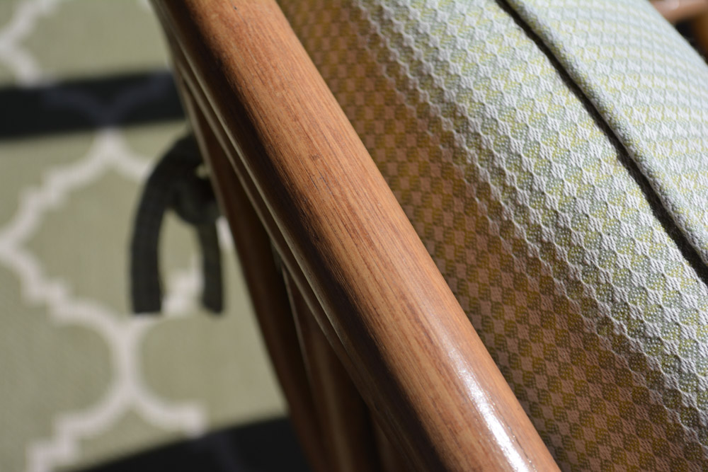 Glass-Top Pedestal Table with Rattan Chairs