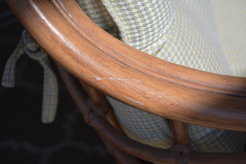 Glass-Top Pedestal Table with Rattan Chairs