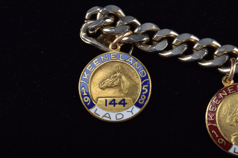 Gold Tone Charm Bracelet with Vintage Keeneland Association Membership Pins