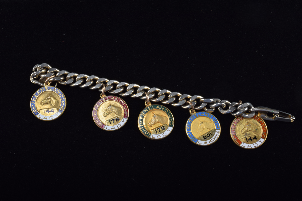 Gold Tone Charm Bracelet with Vintage Keeneland Association Membership Pins