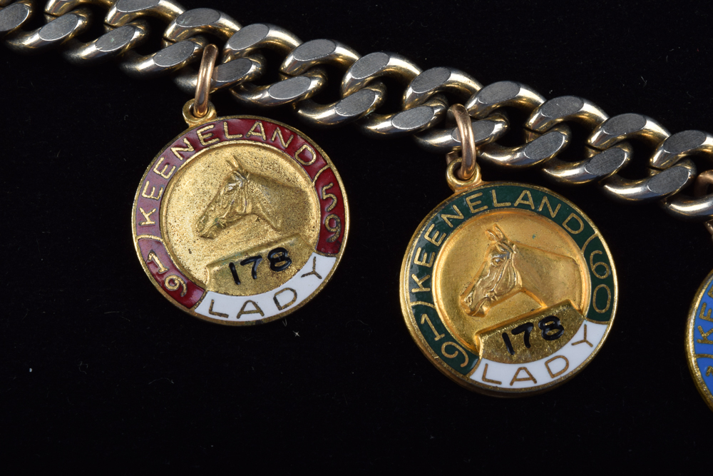 Gold Tone Charm Bracelet with Vintage Keeneland Association Membership Pins