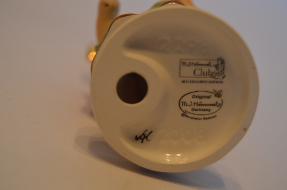 Four M. I. Hummel Exclusive Edition Signed Figurines