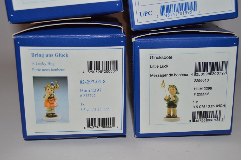 Four M. I. Hummel Exclusive Edition Signed Figurines