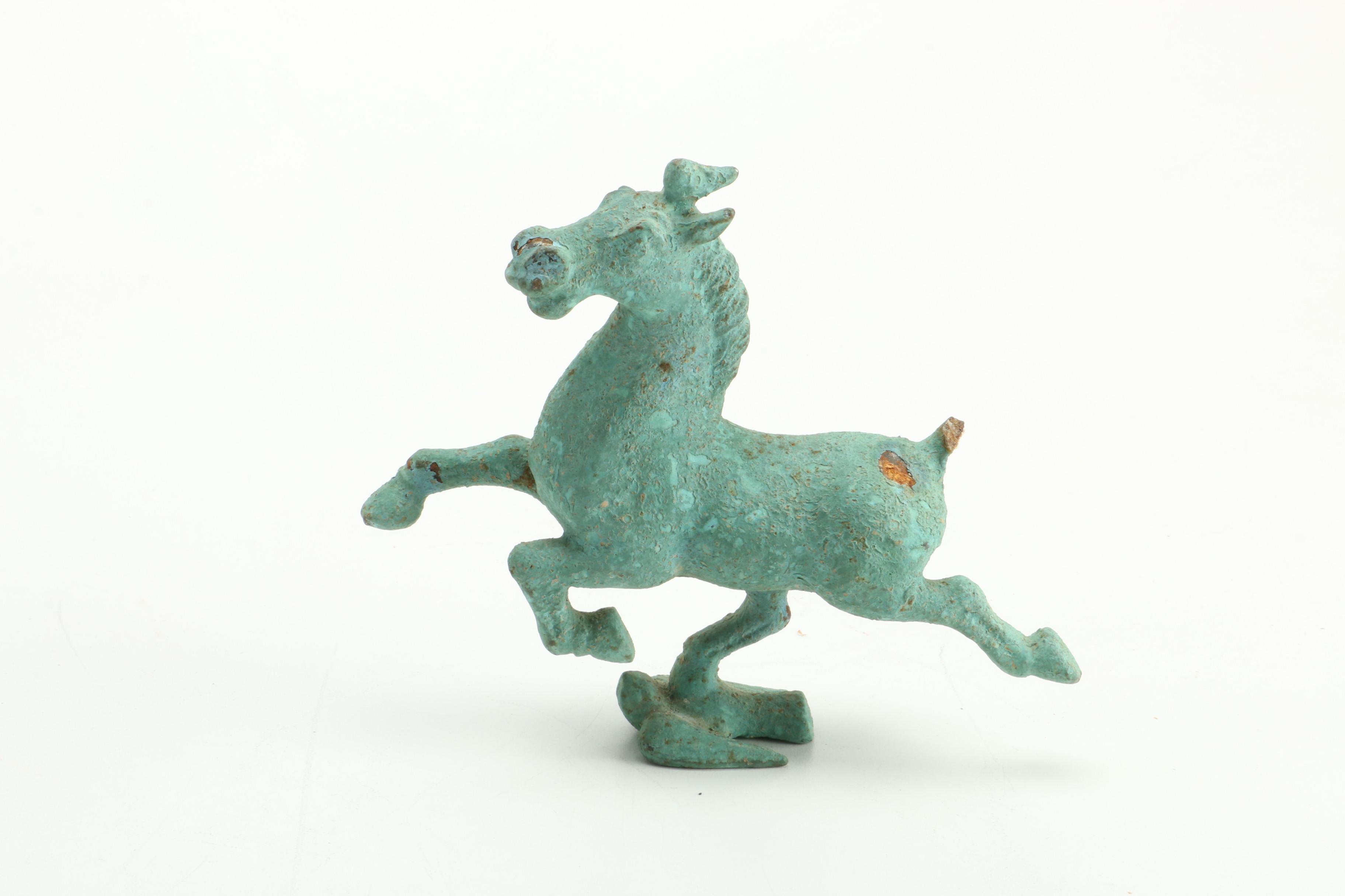 Figurines Including Mexican Figure of Children and Replica of "Gansu Flying Horse"