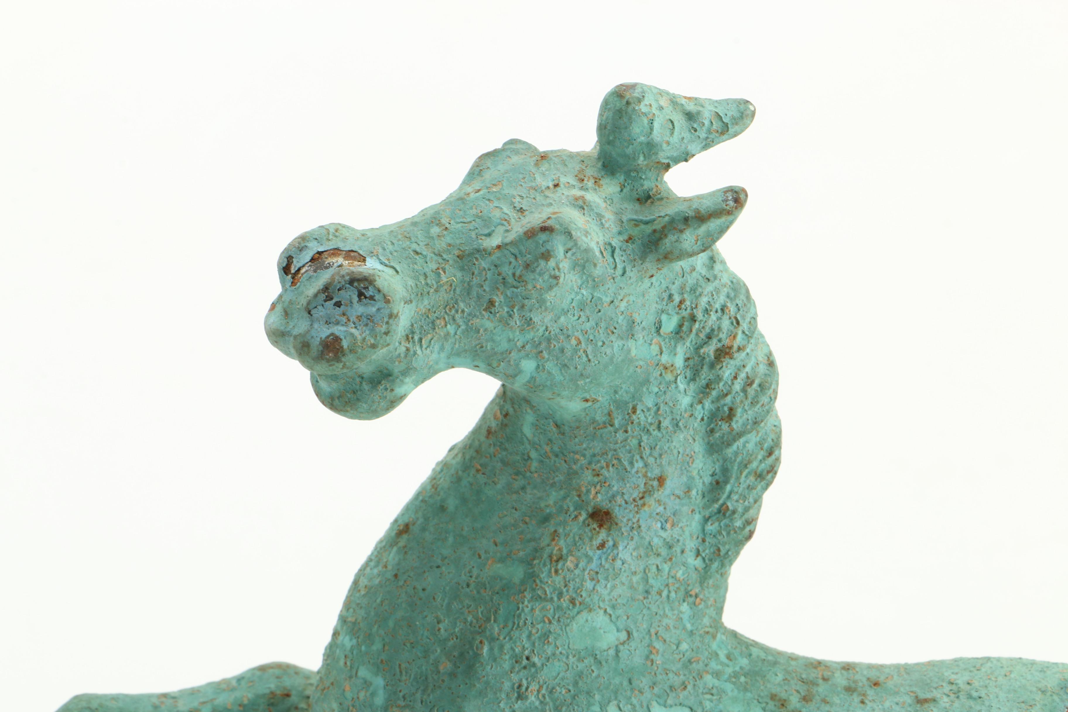 Figurines Including Mexican Figure of Children and Replica of "Gansu Flying Horse"