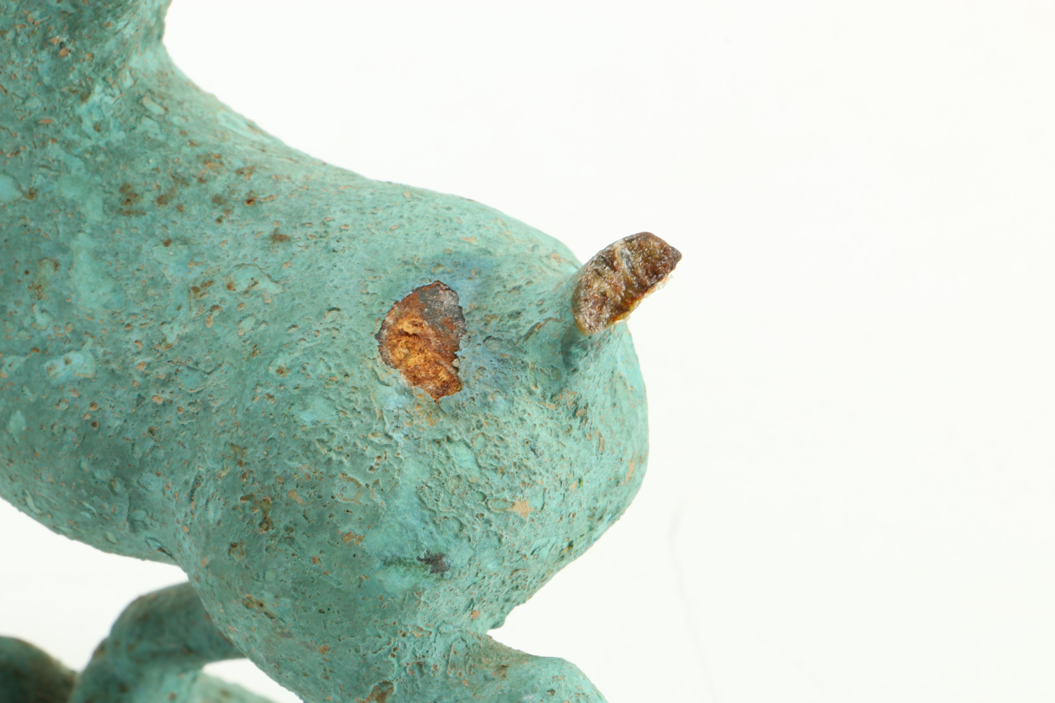 Figurines Including Mexican Figure of Children and Replica of "Gansu Flying Horse"