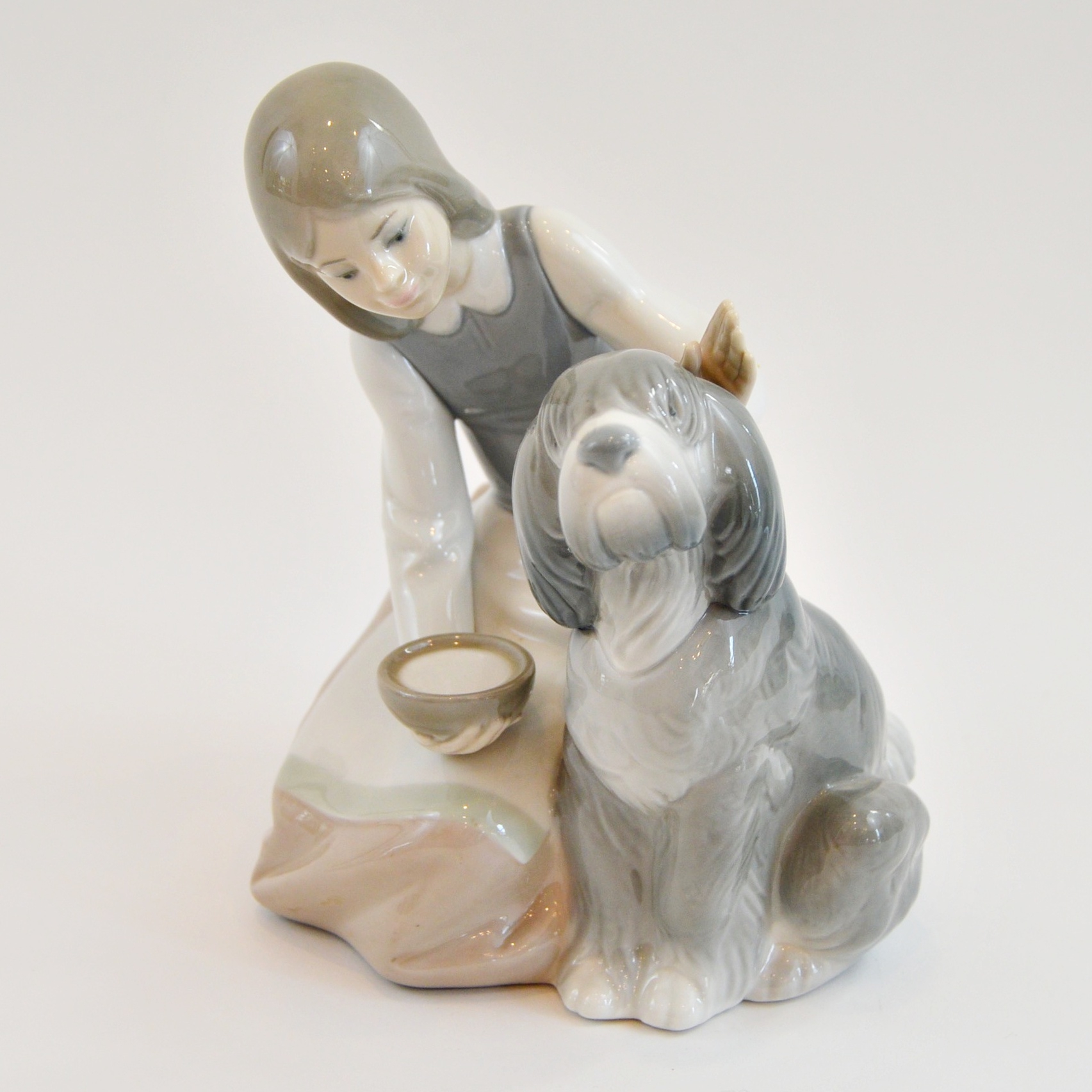 Lladro "Girl Feeding Dog"