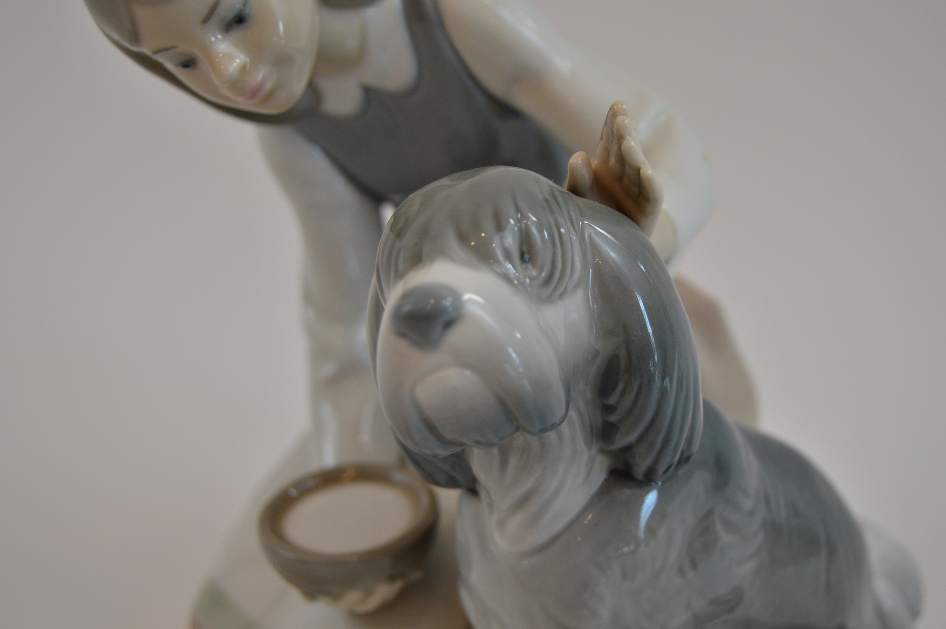 Lladro "Girl Feeding Dog"