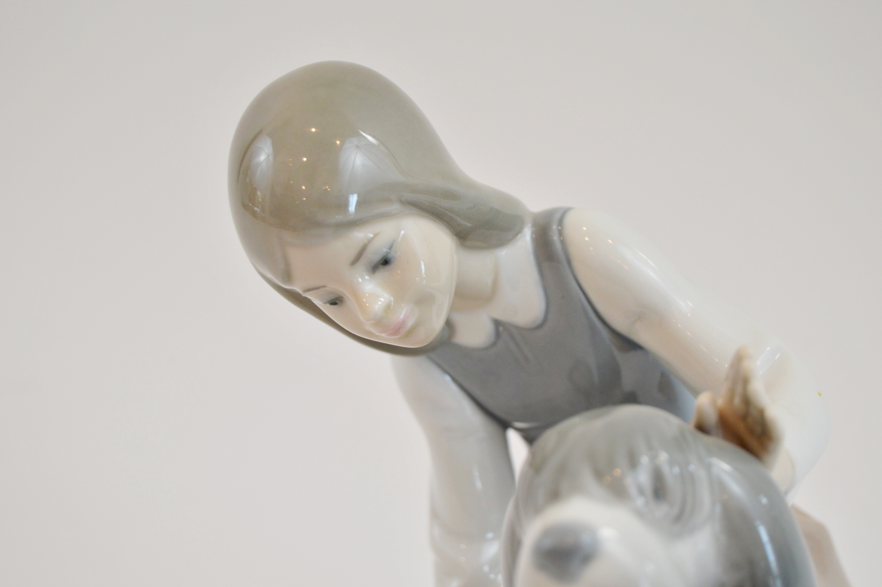 Lladro "Girl Feeding Dog"